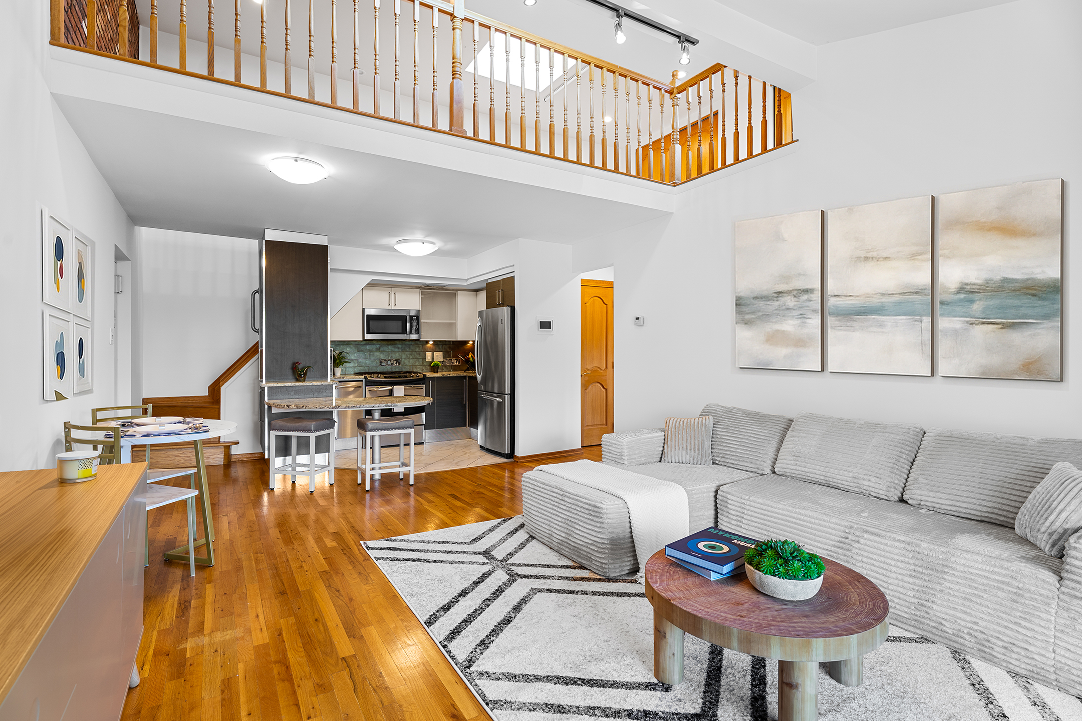 336 99th Street, Unit 15 Brooklyn, NY 11209 - Photo 1 of 7 a living room with furniture and a table
