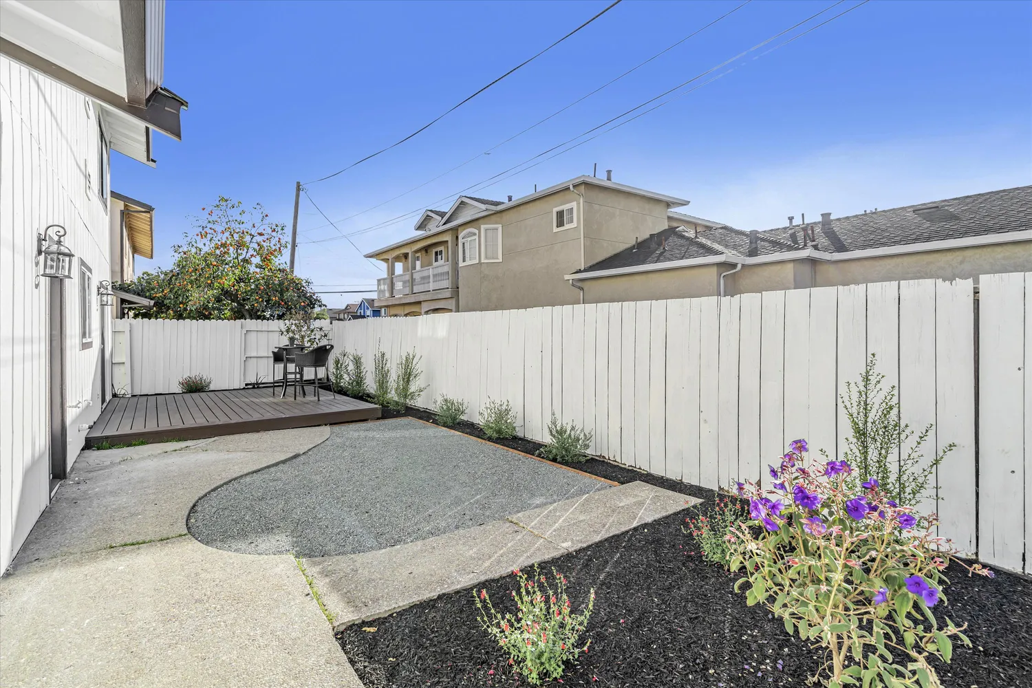 a view of a chair and table in the balcony