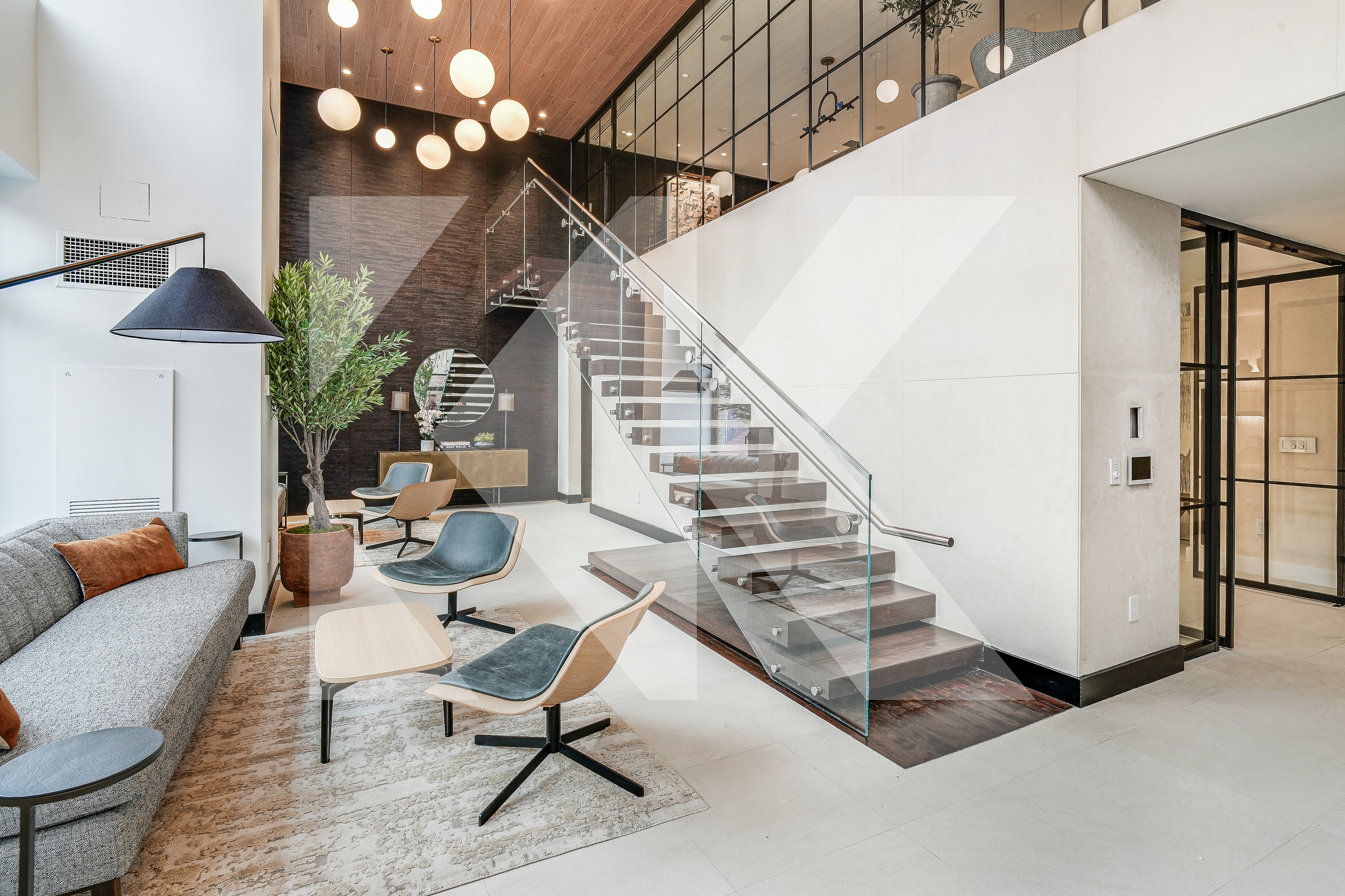 400 East 67th Street, Unit 3CD Manhattan, NY 10065 - Photo 19 of 28 a living room with furniture a lamp and a potted plant