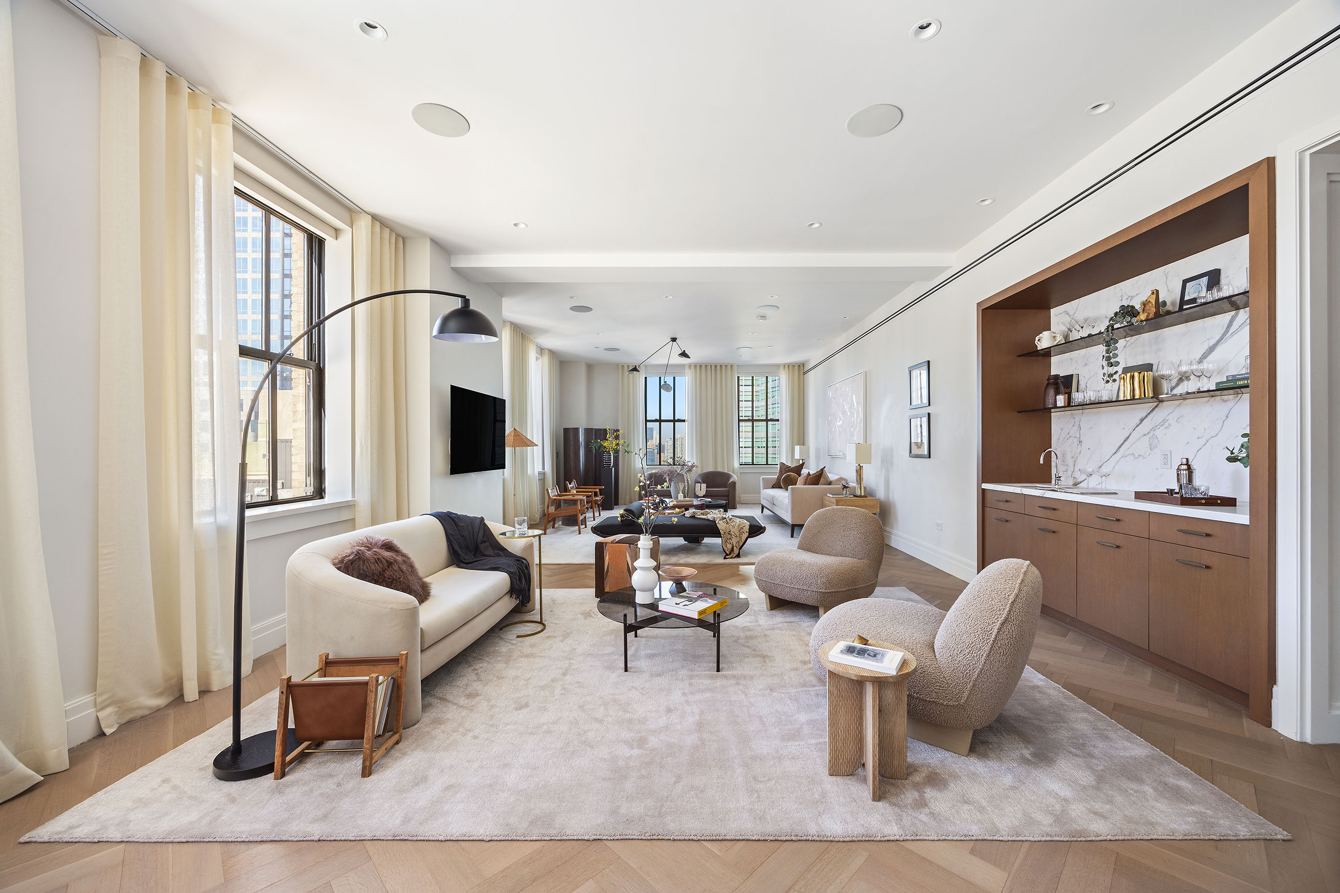 100 Barclay Street, Unit 21AD Manhattan, NY 10007 - Photo 4 of 37 a living room with furniture or couch and a large window