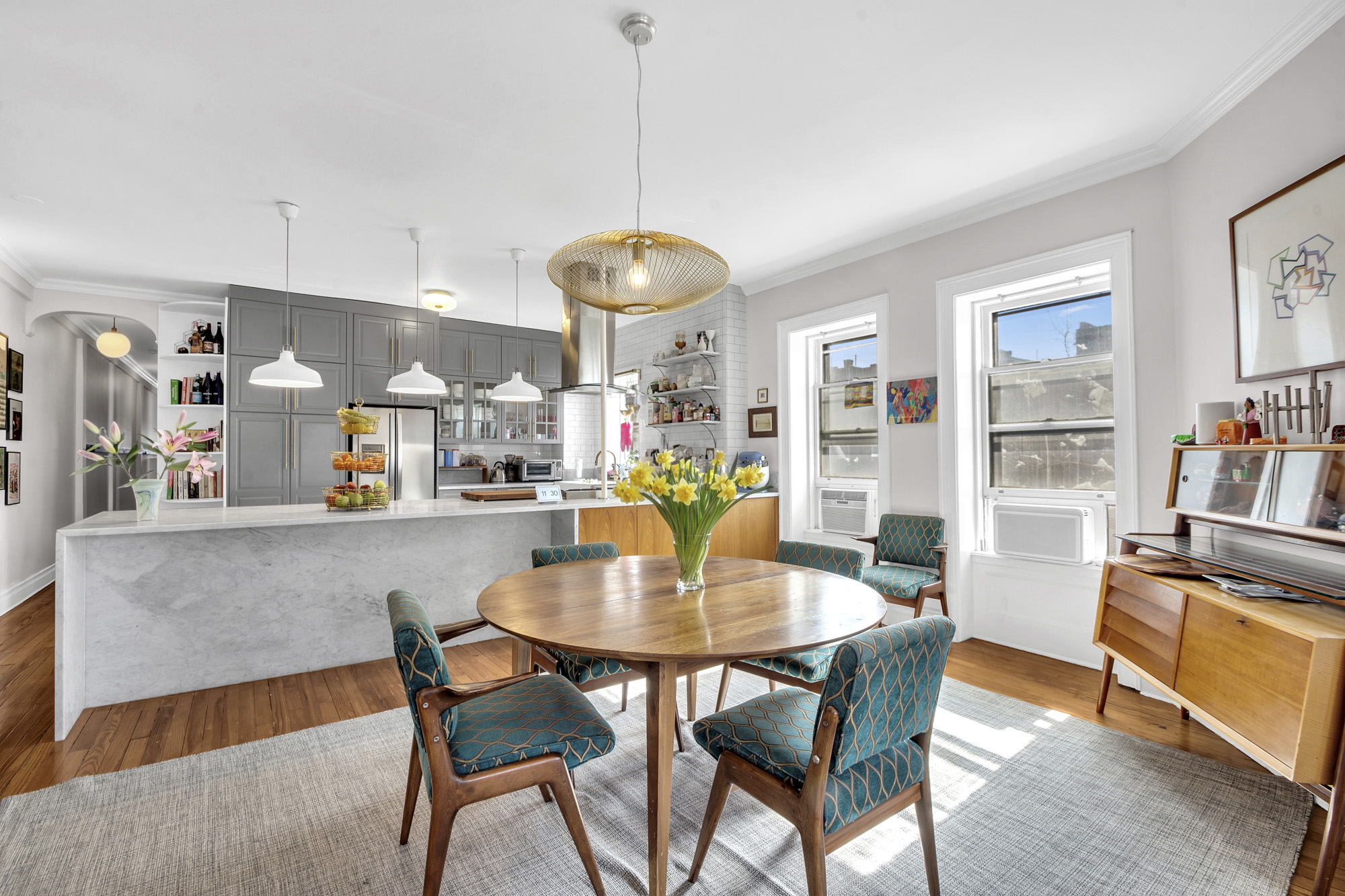 275 Clinton Avenue, Unit 4-1 Brooklyn, NY 11205 - Photo 6 of 20 a dining room with furniture and wooden floor