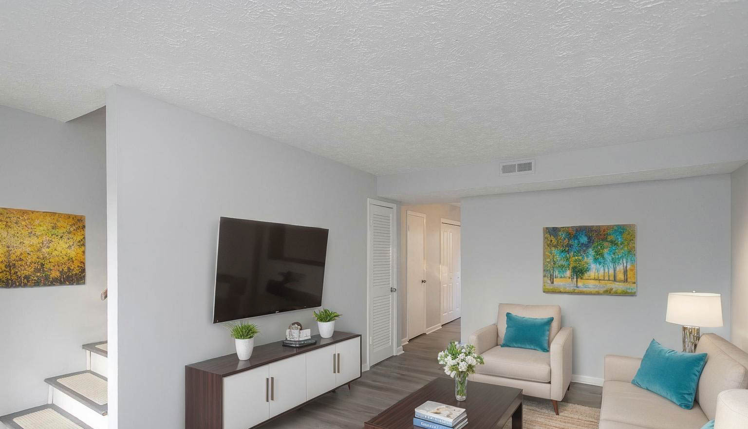Falls Creek Drive, Unit 3307 & 3309 Nashville, TN 37214 - Photo 10 of 51 a living room with furniture and a flat screen tv