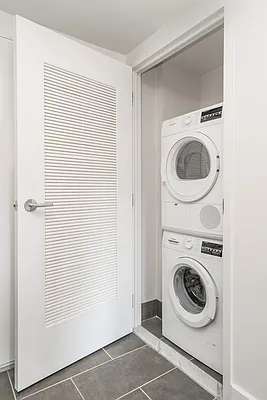 310 Clarkson Avenue, Unit 511 Brooklyn, NY 11226 - Photo 4 of 12 a utility room with dryer and washer