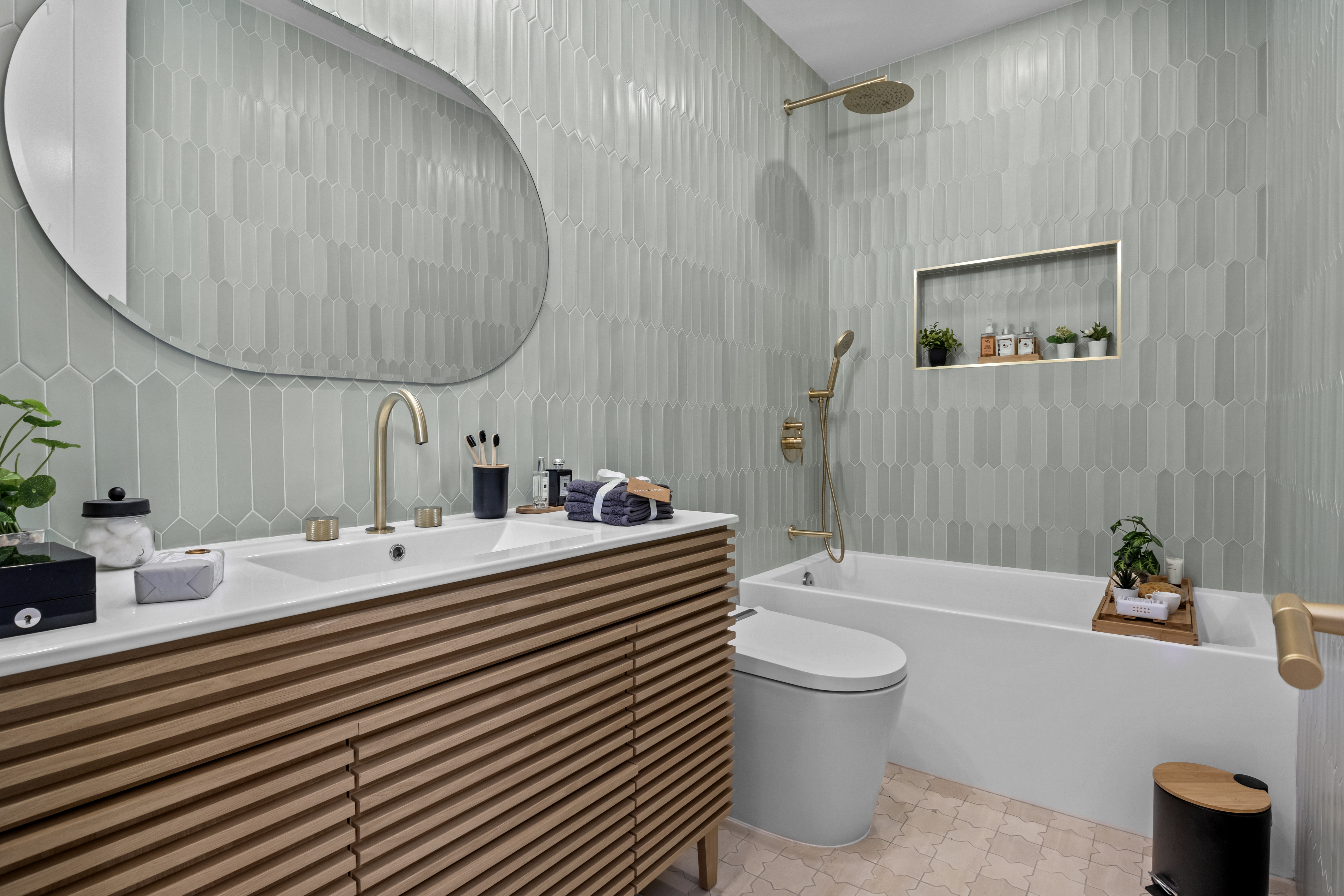 320 10th Street Brooklyn, NY 11215 - Photo 15 of 27 a bathroom with a sink a toilet and a mirror