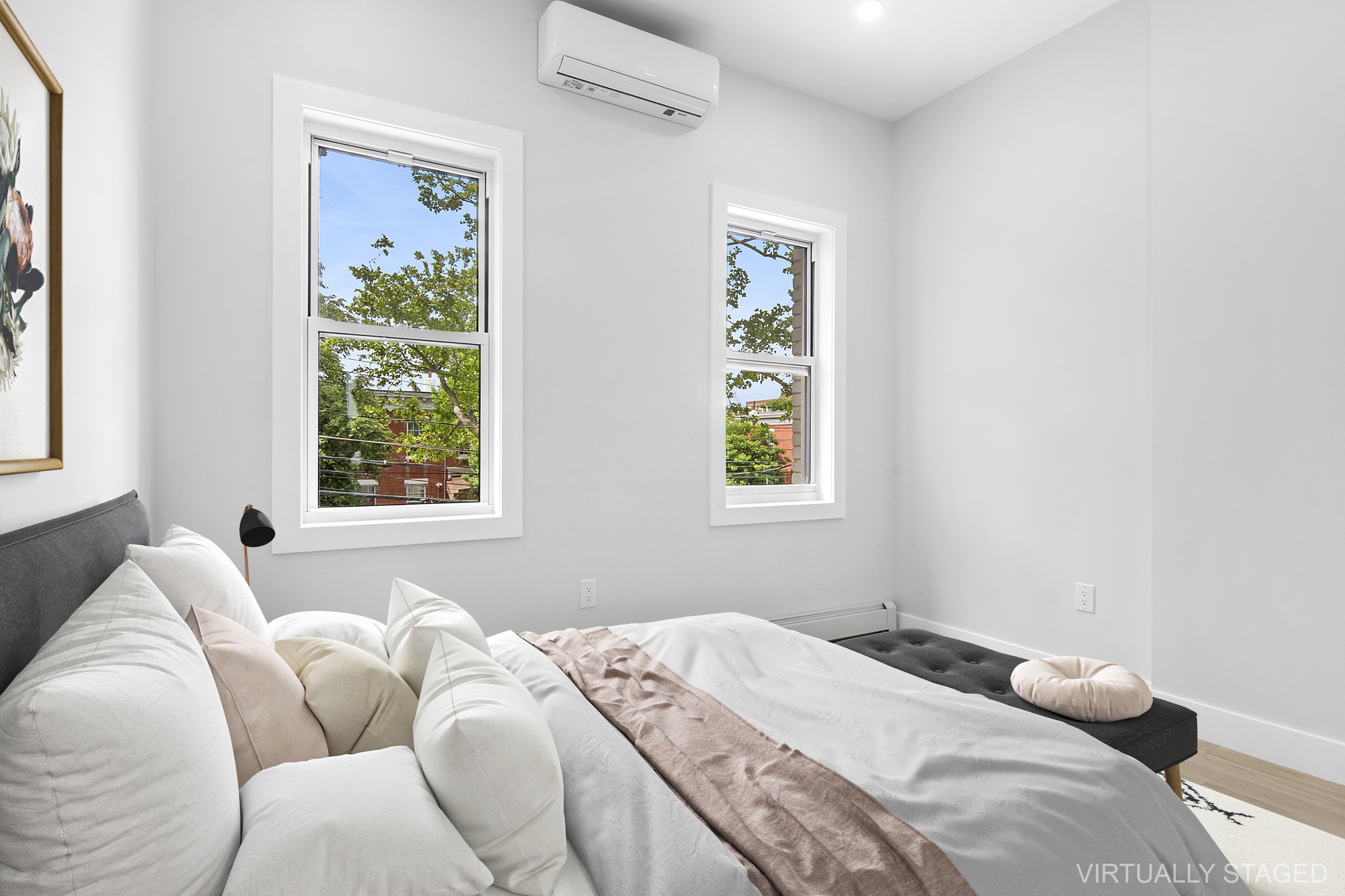 41-05 20th Avenue Queens, NY 11105 - Photo 7 of 20 a bedroom with bed and a window