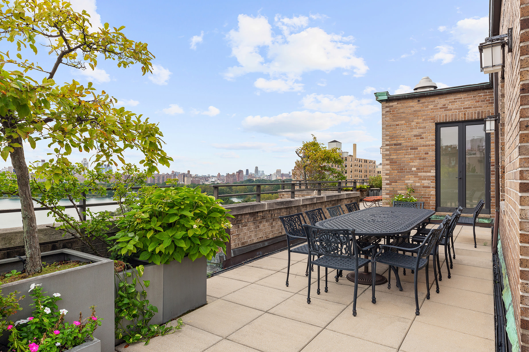 14 East 90th Street, Unit PHW Manhattan, NY 10128 - Photo 2 of 25 a view of a dinning table and chairs in patio