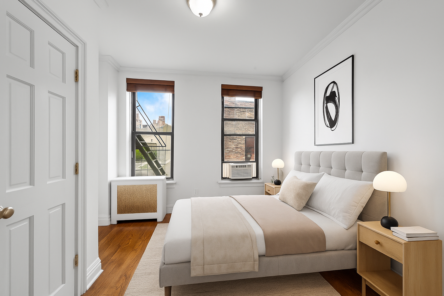 142 Sullivan Street, Unit 21 Manhattan, NY 10012 - Photo 4 of 8 a bedroom with bed and window