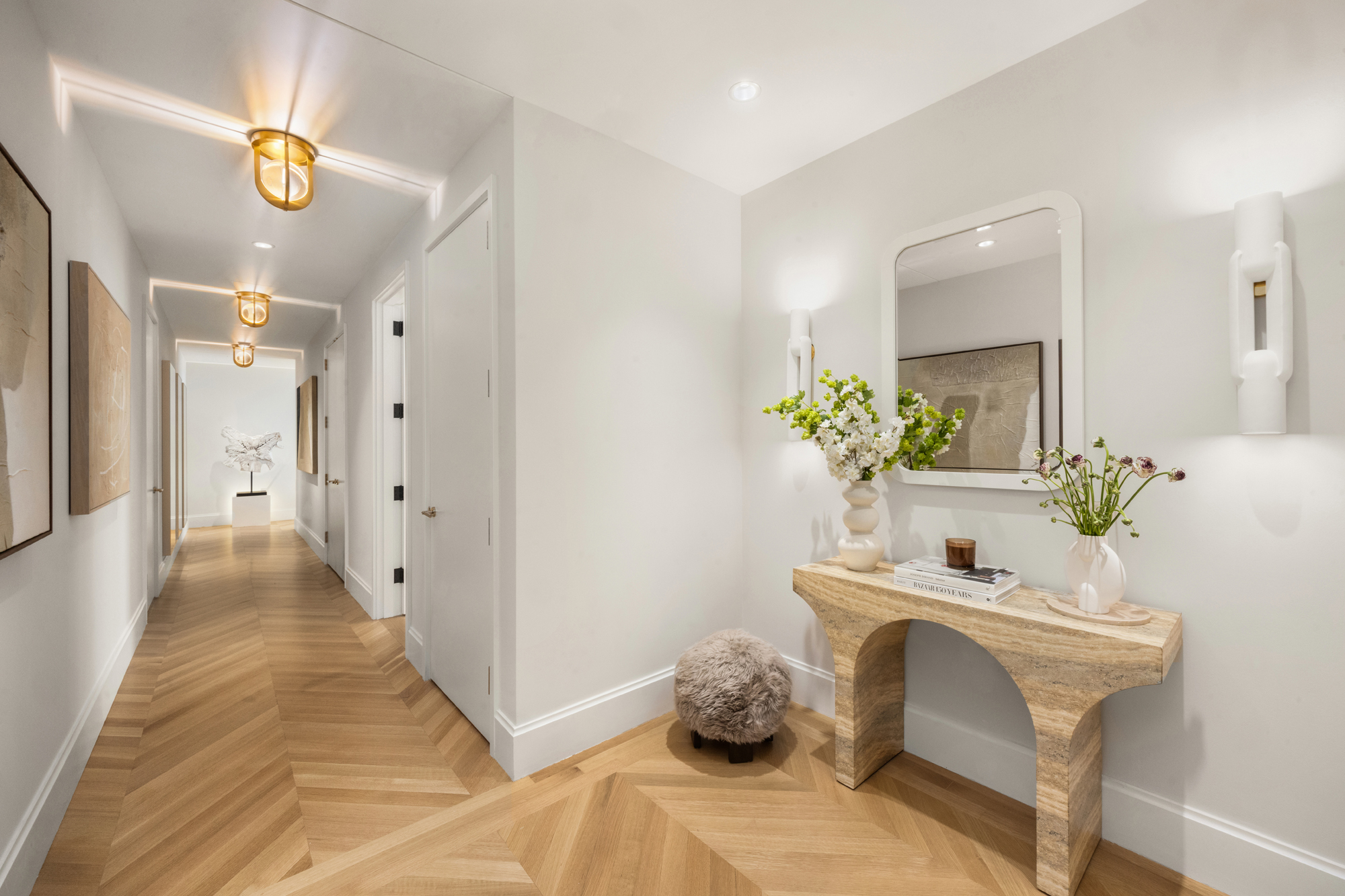 217 West 57th Street, Unit 34F Manhattan, NY 10019 - Photo 15 of 25 a bathroom with a sink and a mirror