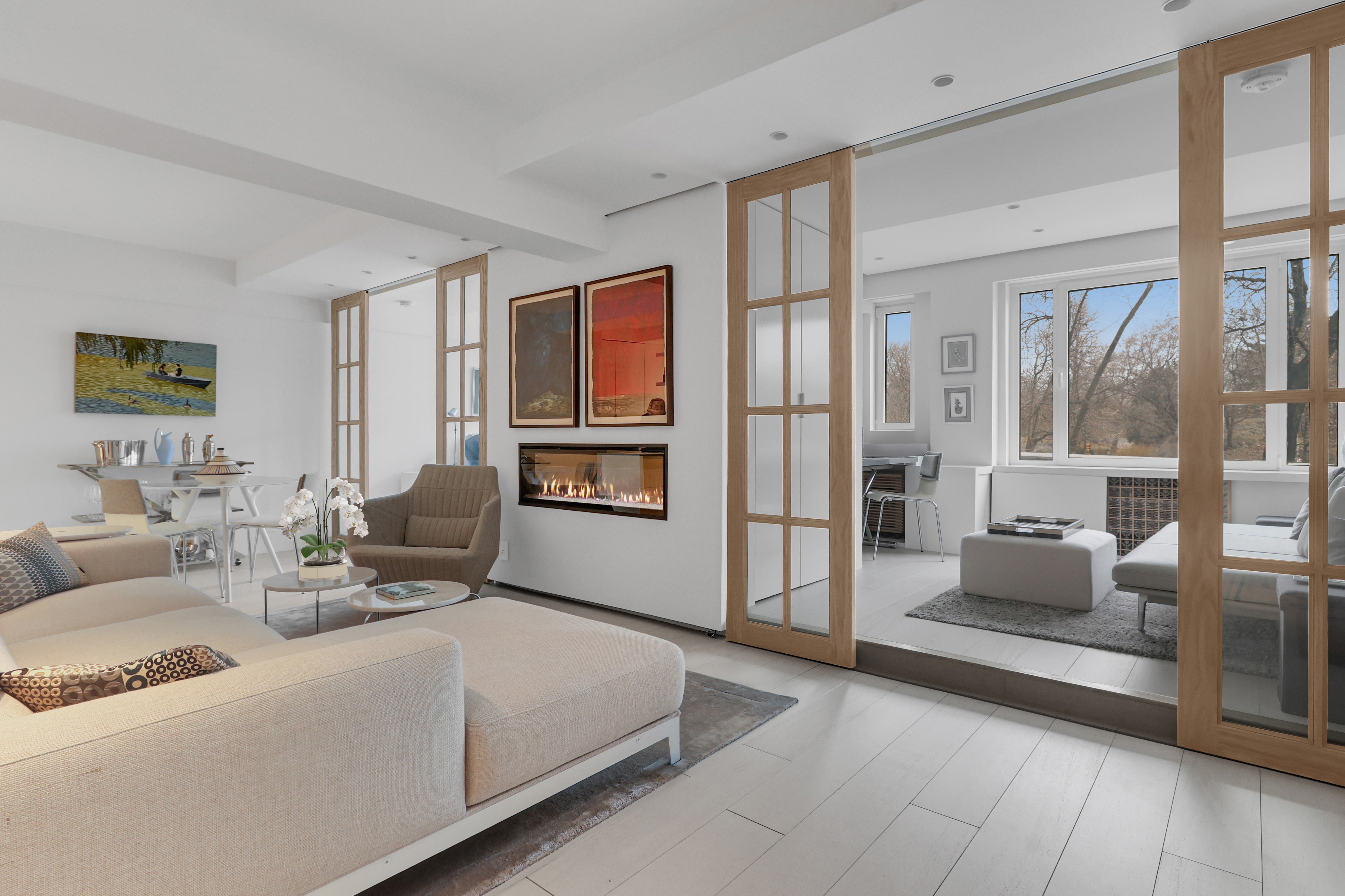 a living room with furniture and a table