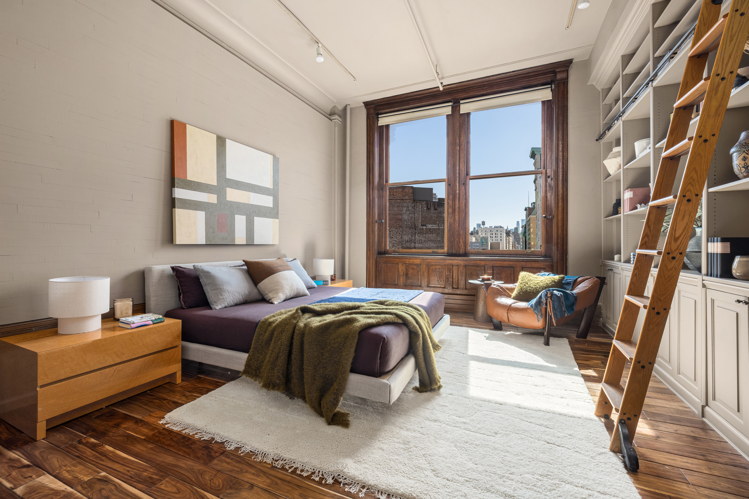 874 Broadway, Unit 501 Manhattan, NY 10003 - Photo 11 of 17 a bedroom with furniture and a window