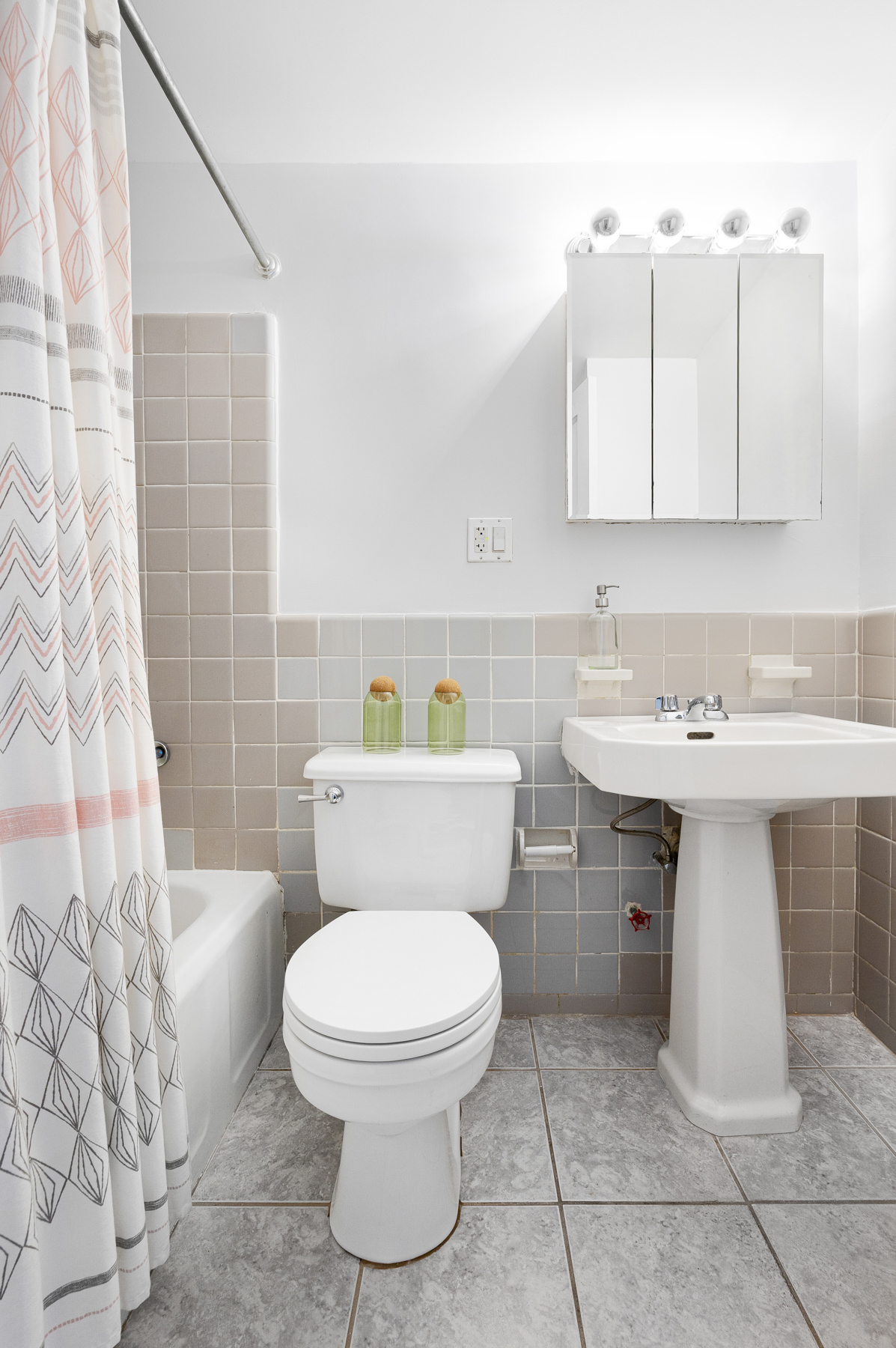 355 Clinton Avenue, Unit 9A Brooklyn, NY 11238 - Photo 8 of 10 a white toilet sitting next to a bathroom sink