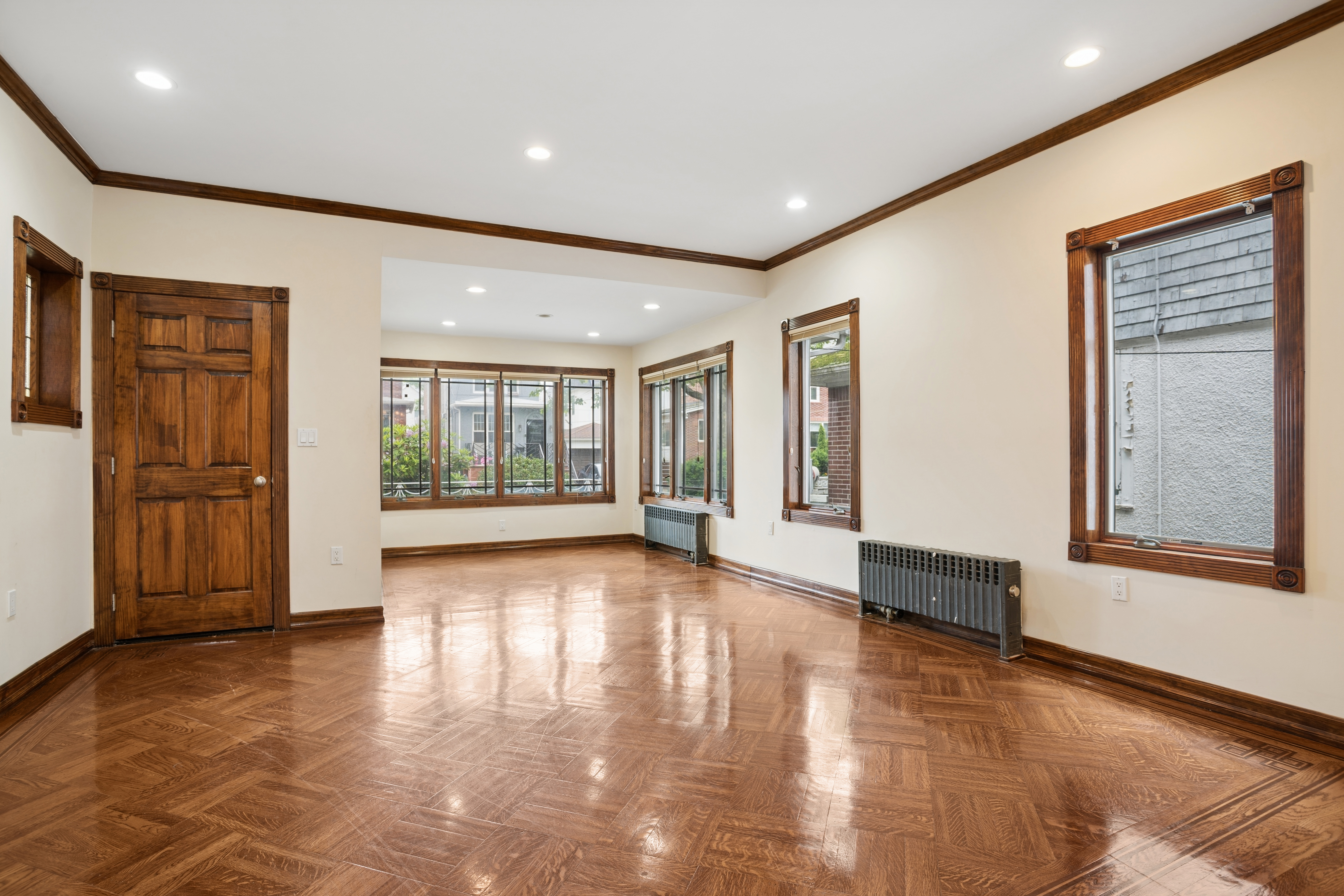 1982 East 23rd Street Brooklyn, NY 11229 - Photo 4 of 16 a view of an entryway with wooden floor