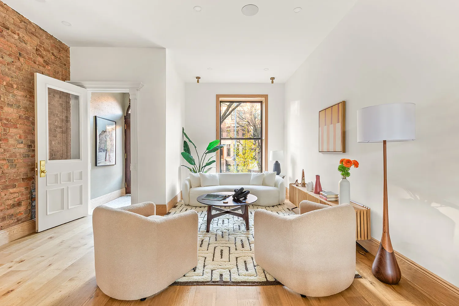 a living room with furniture and a table
