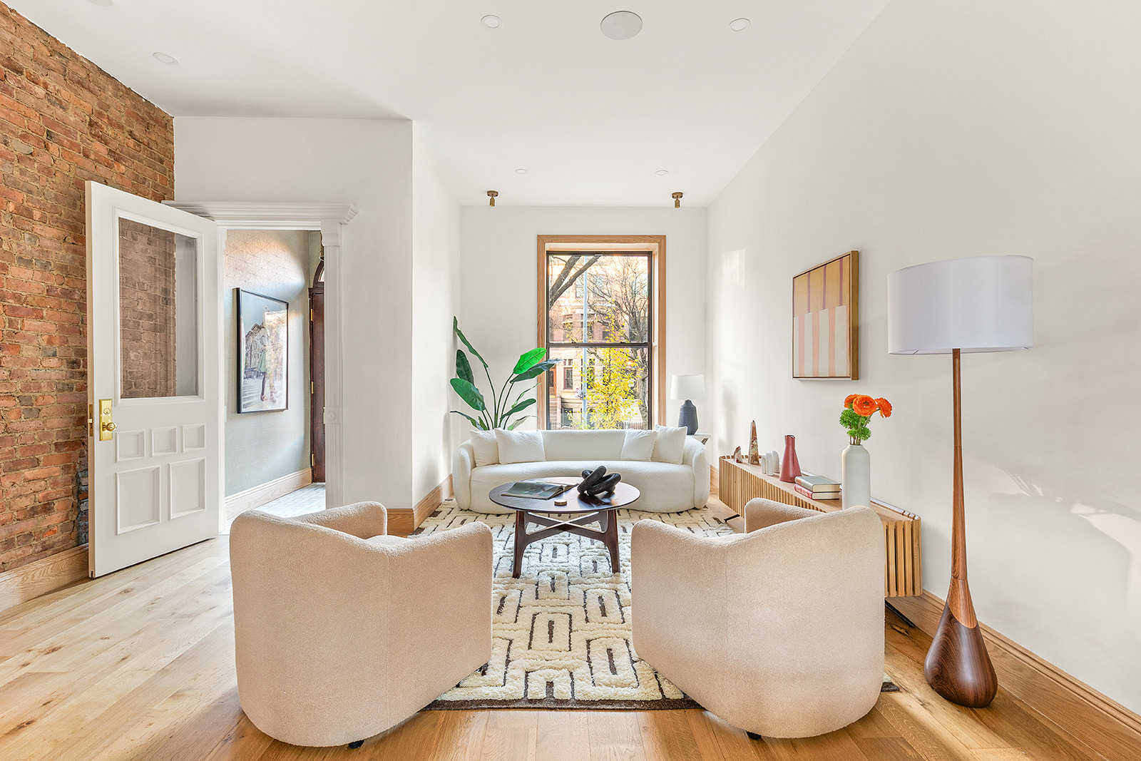 a living room with furniture and a table