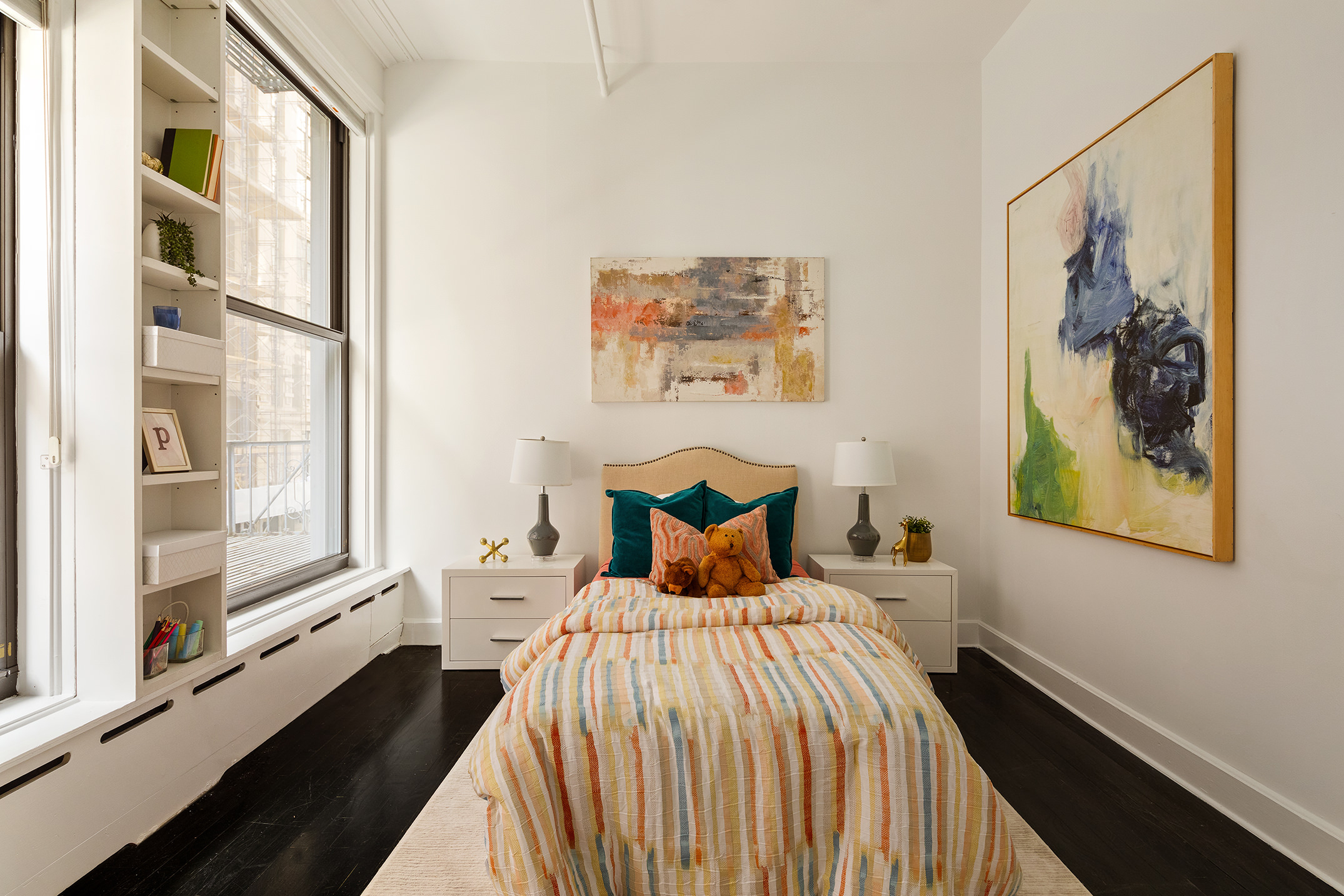 142 5th Avenue, Unit 2 Manhattan, NY 10011 - Photo 8 of 18 a bedroom with a bed and a large window with outer view
