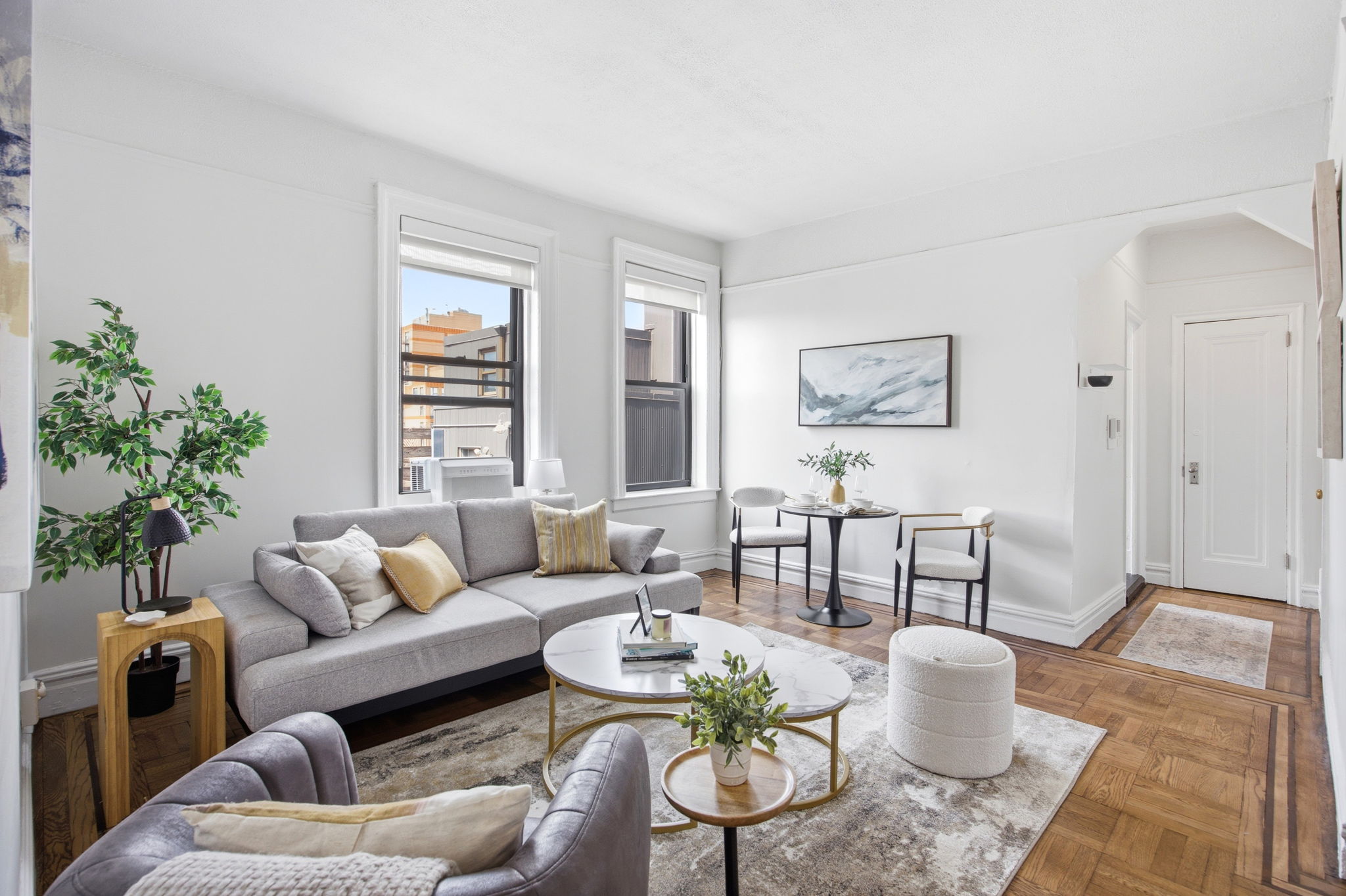 485 Central Park West, Unit 7A Manhattan, NY 10025 - Photo 3 of 15 a living room with furniture and a potted plant