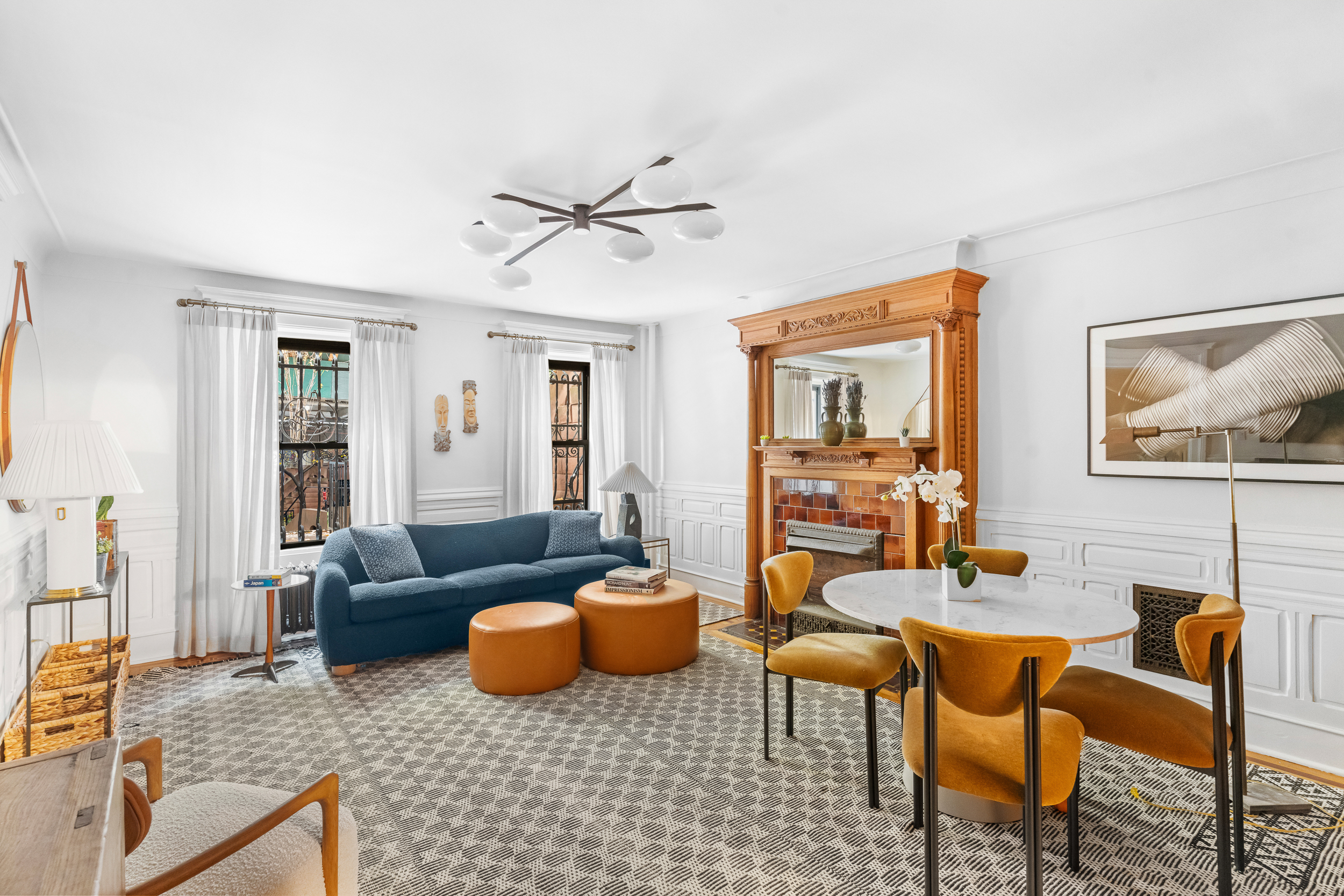 479 4th Street, Unit GARDEN Brooklyn, NY 11215 - Photo 3 of 8 a living room with furniture a couch and two windows
