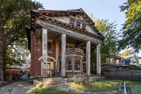 front view of a house with a yard