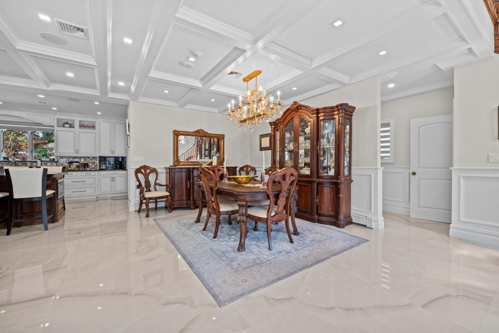2253 East 64th Street Brooklyn, NY 11234 - Photo 14 of 45 a view of a a dining room with furniture and chandelier