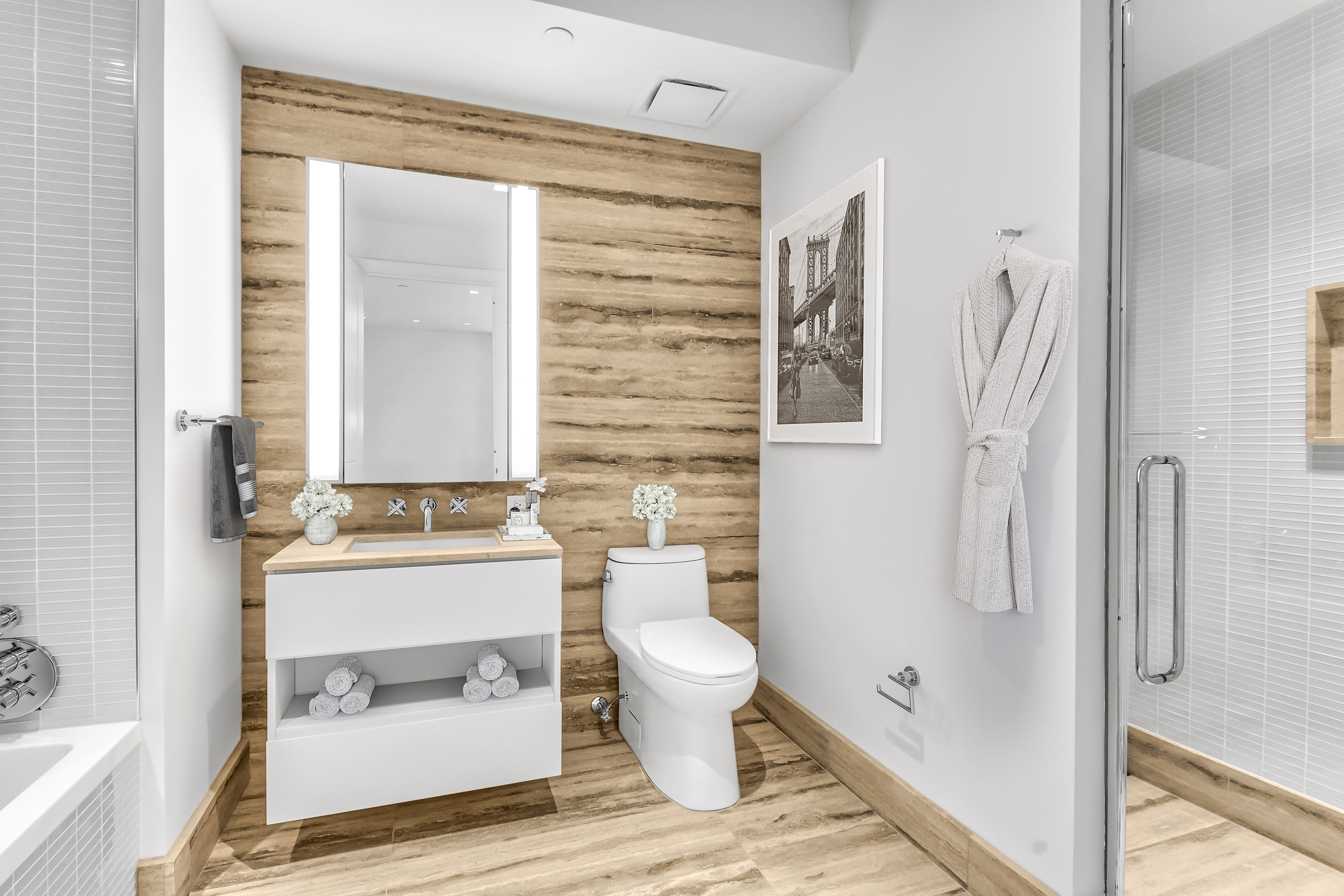 1 Wall Street, Unit 2512 Manhattan, NY 10005 - Photo 9 of 31 a bathroom with a sink toilet and shower