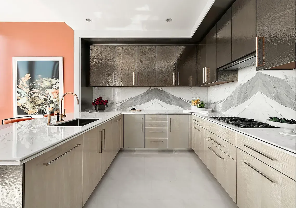 a kitchen with granite countertop white cabinets and white appliances