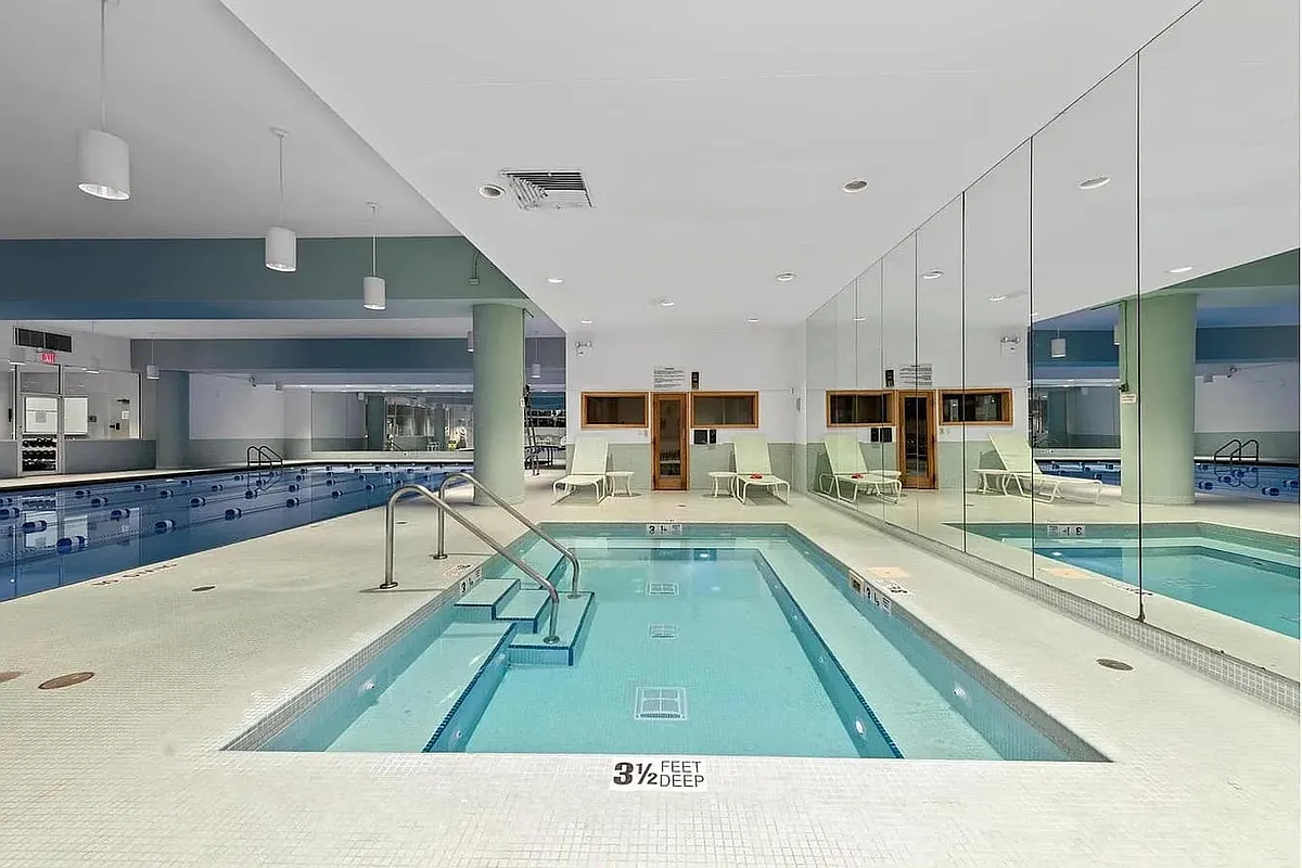 235 East 40th Street, Unit 11G Manhattan, NY 10016 - Photo 12 of 20 a bathroom with a tub and view living room