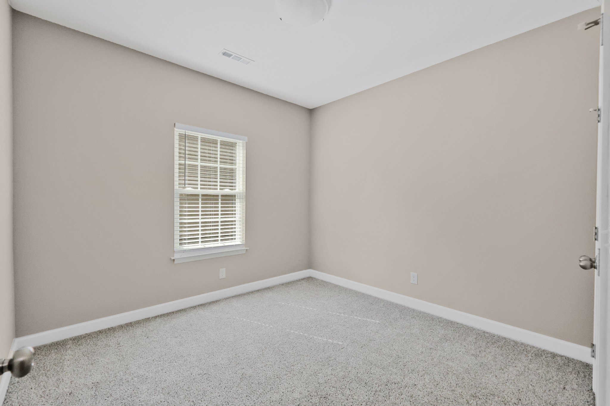 871 Blessings Way Gallatin, TN 37066 - Photo 17 of 25 an empty room with a window