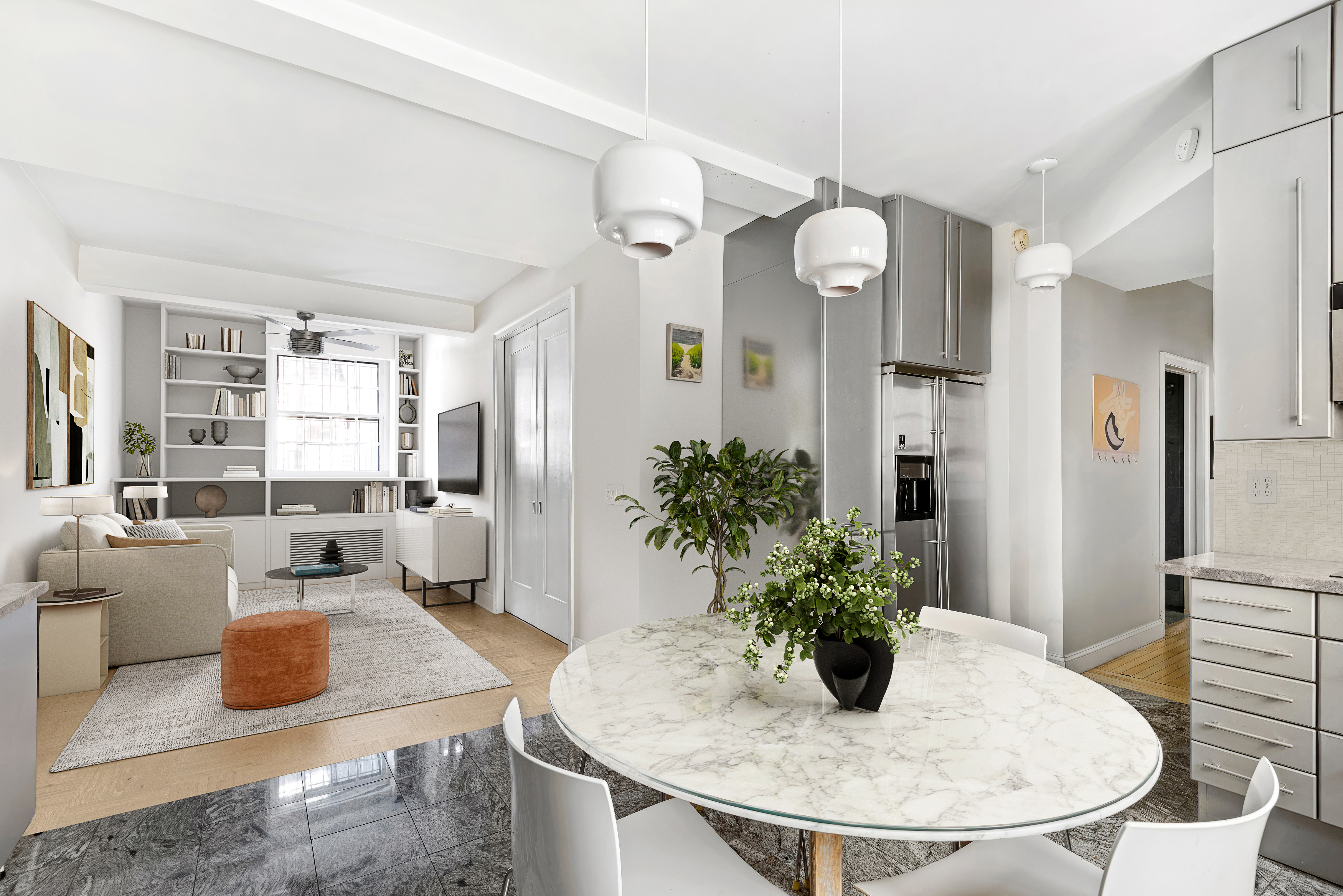 24 Monroe Place, Unit MD Brooklyn, NY 11201 - Photo 1 of 9 a kitchen with a refrigerator and a dining table
