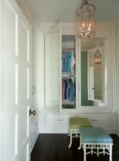a bedroom with furniture and a lamp