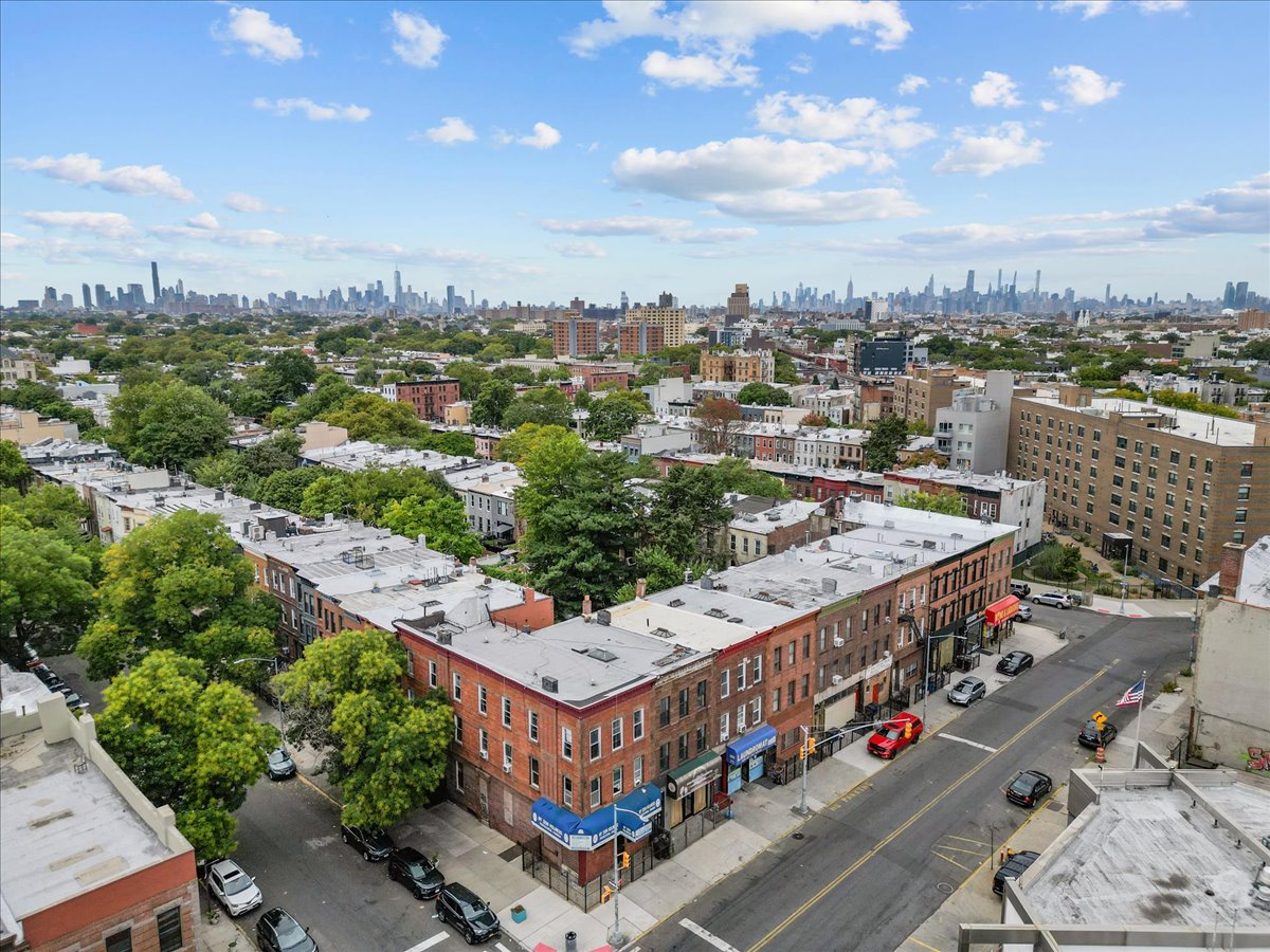 34 Rockaway Avenue, Unit MIXED Brooklyn, NY 11233 - Photo 8 of 11 a view of a terrace with wooden stairs