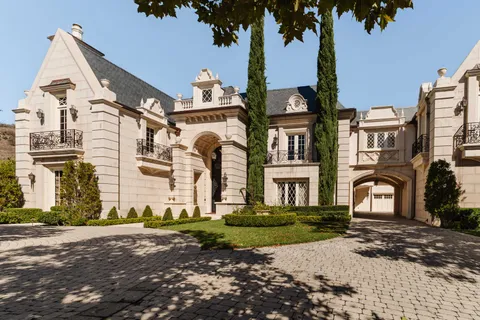 a view of a street in front of a building
