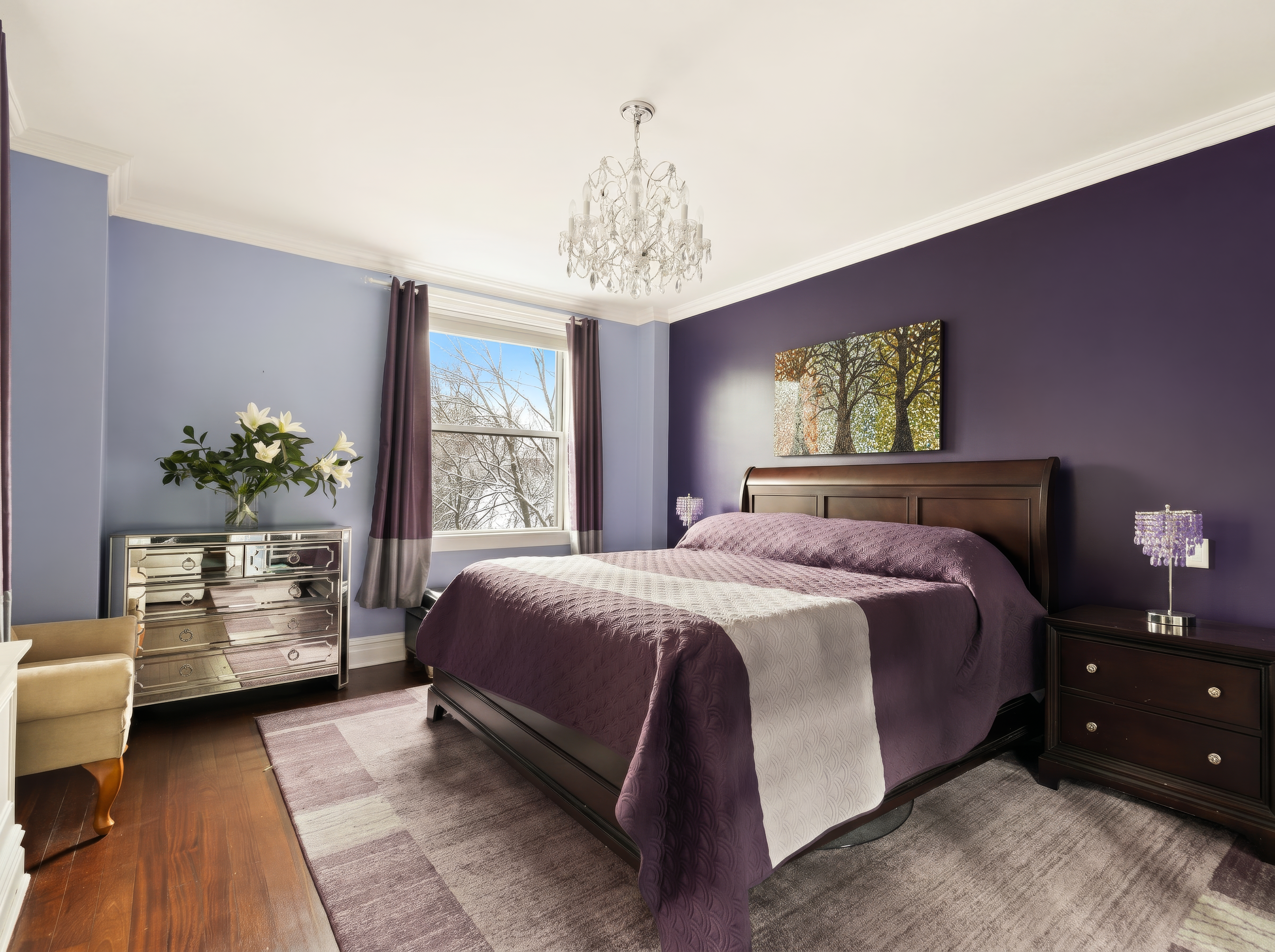 1158 5th Avenue, Unit 4A Manhattan, NY 10128 - Photo 10 of 24 a bedroom with a bed and a chandelier