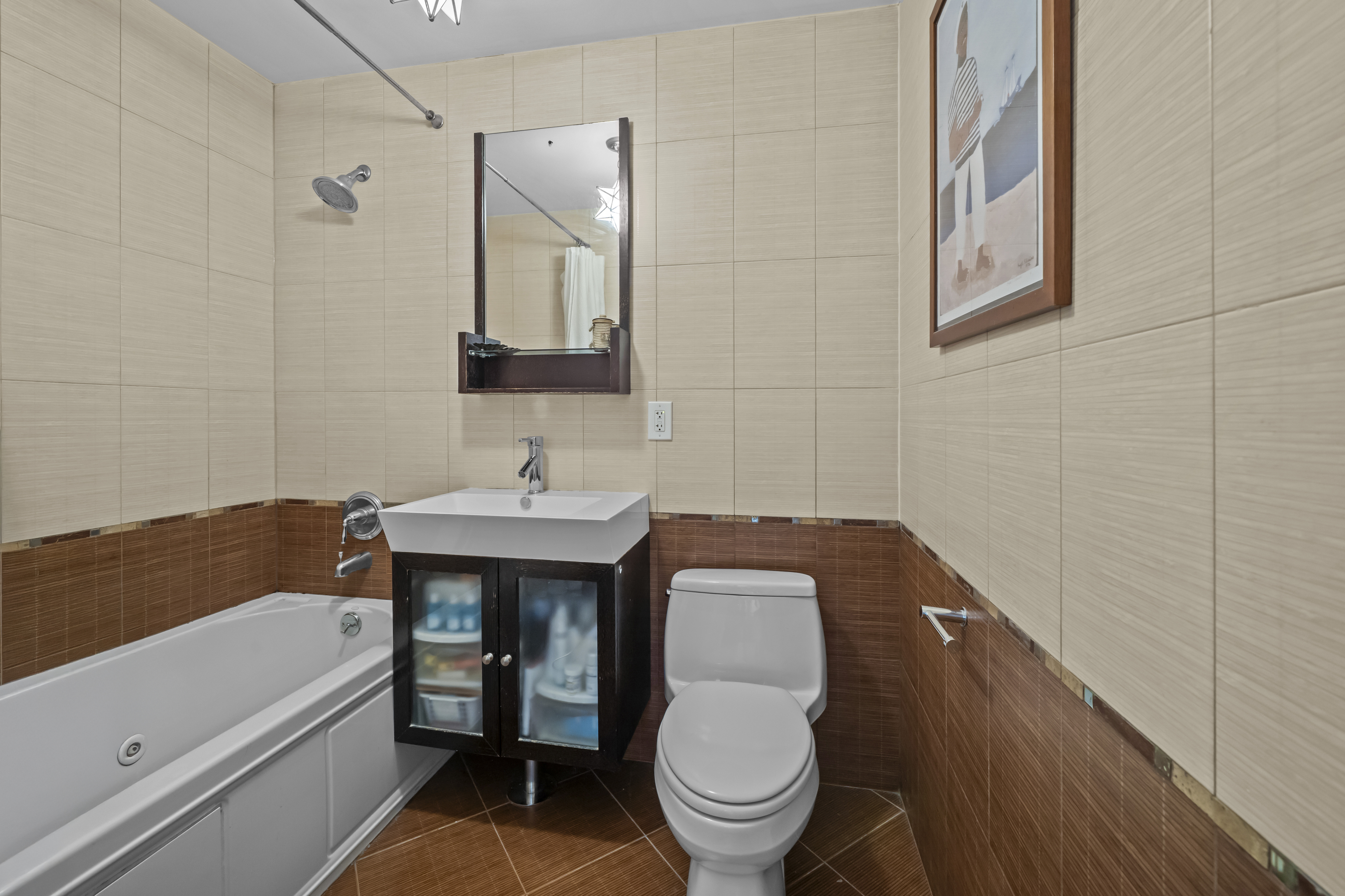 368 12th Street, Unit 5 Brooklyn, NY 11215 - Photo 9 of 11 a bathroom with a toilet sink and mirror