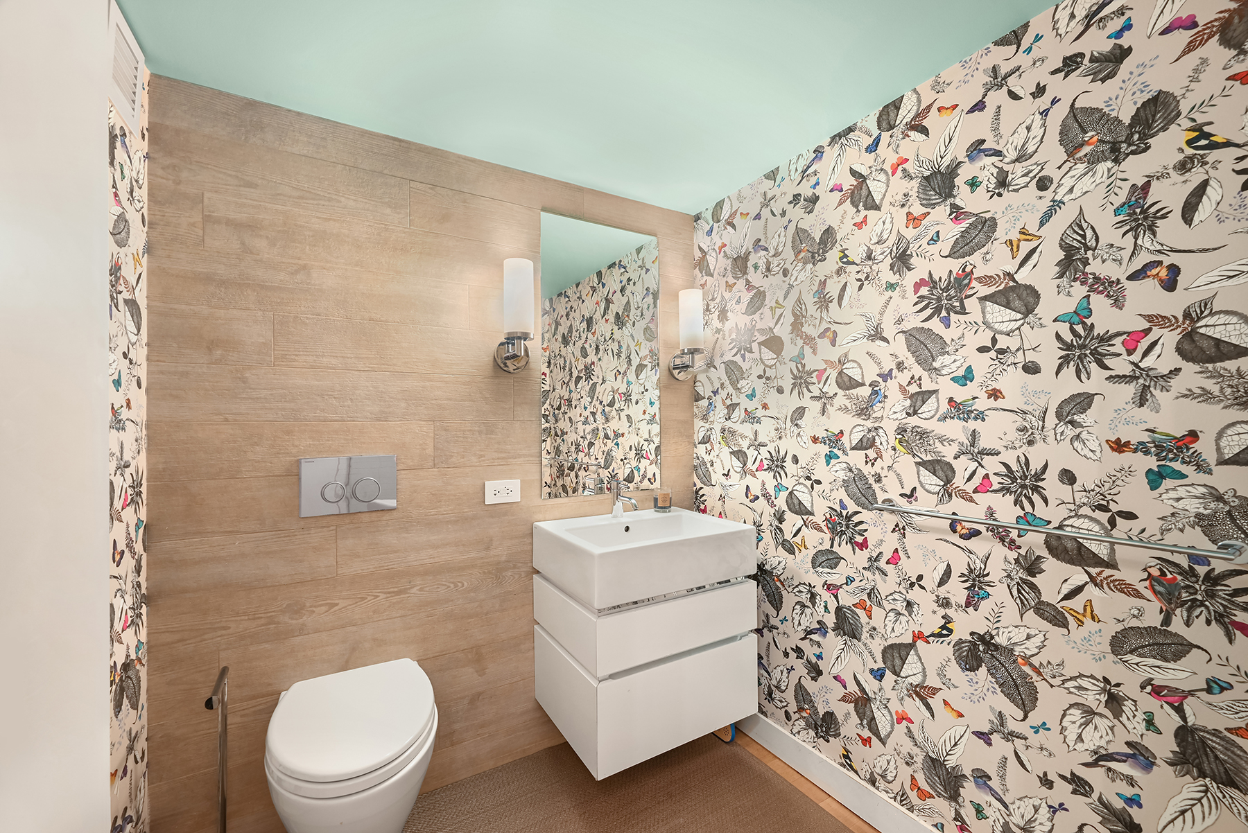 421 Hudson Street, Unit 318 Manhattan, NY 10014 - Photo 6 of 12 a bathroom with a sink toilet and shower