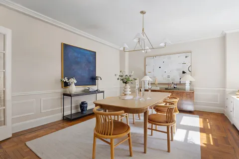 a view of a dining room with furniture