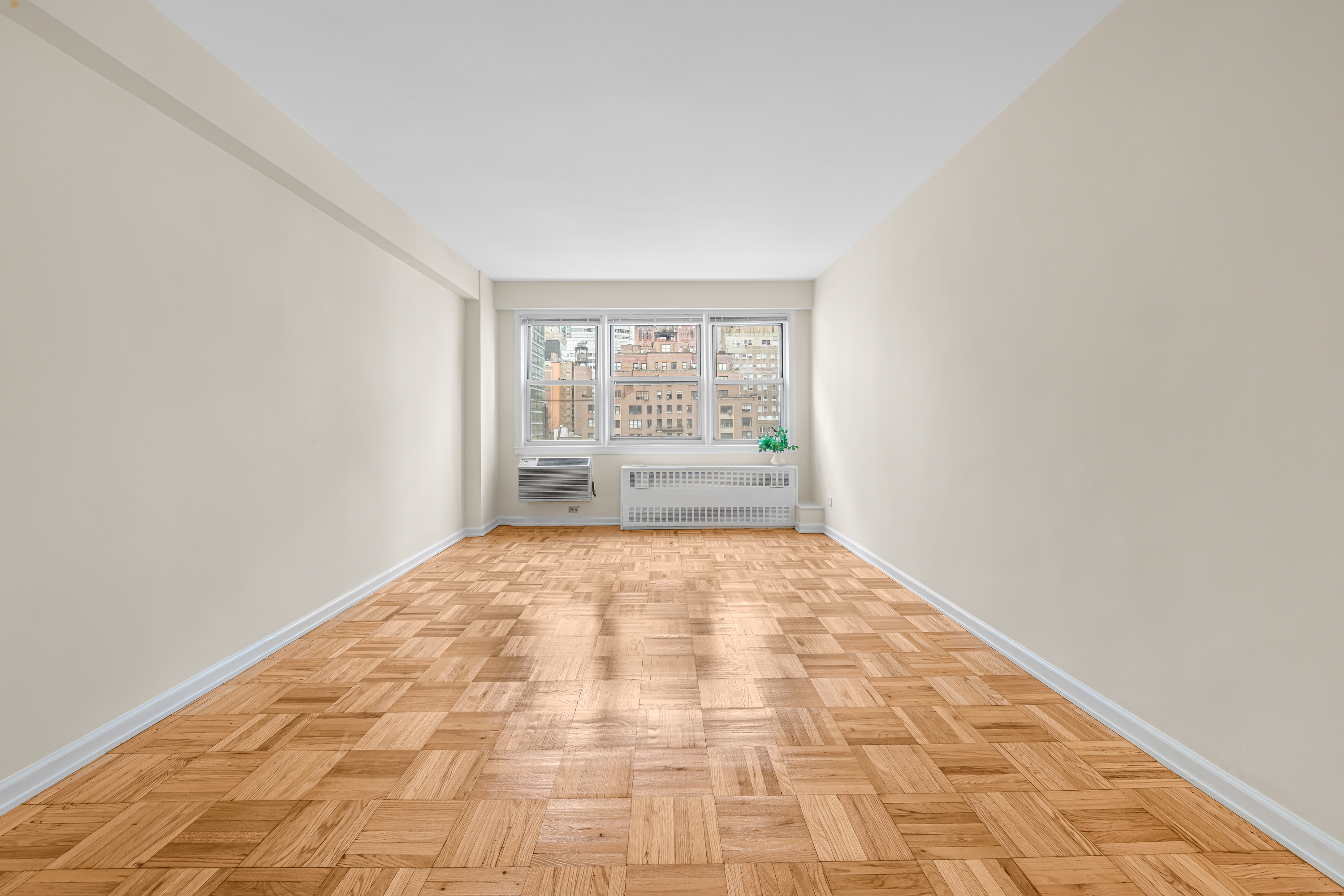 150 East 37th Street, Unit 10F Manhattan, NY 10016 - Photo 6 of 20 an empty room with a empty space and window