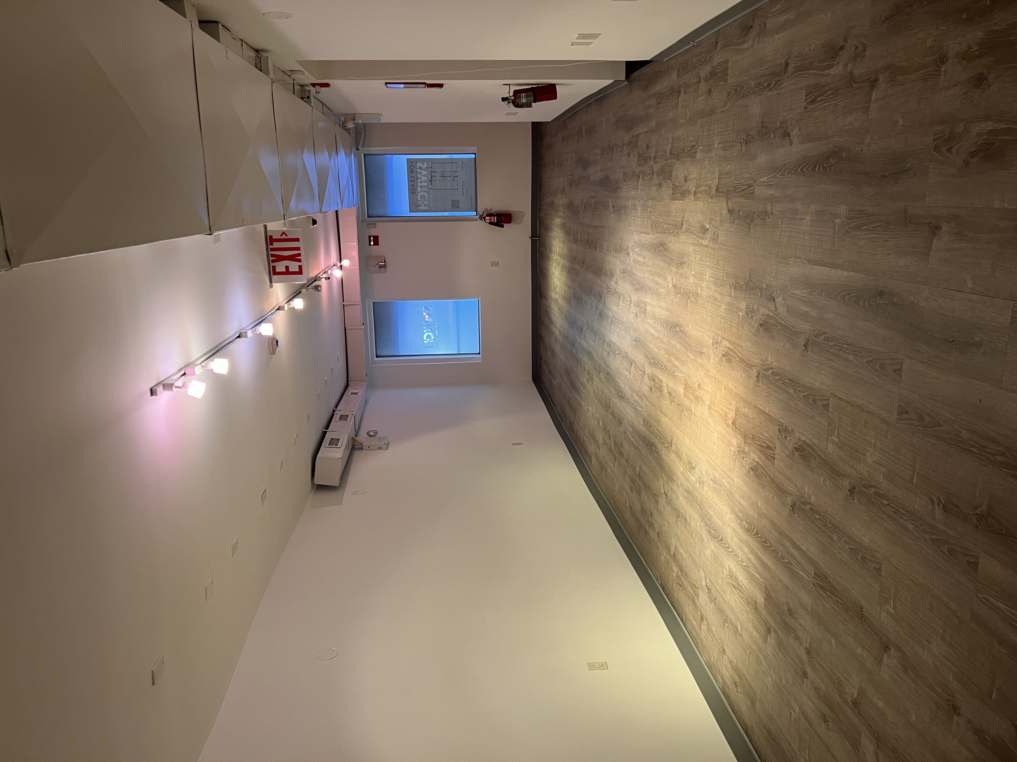 127 East 31st Street, Unit PROFESSIONAL Manhattan, NY 10016 - Photo 4 of 7 a view of a room with wooden floor