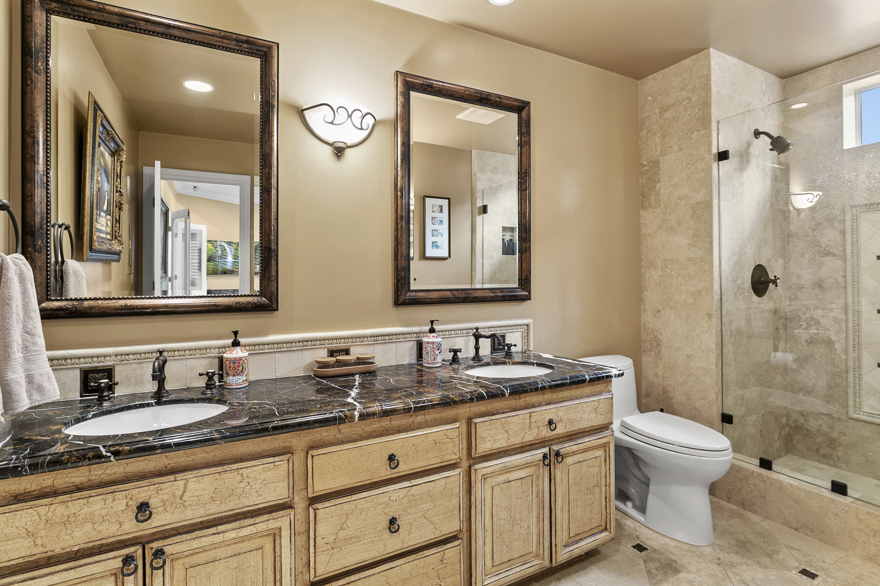 10 Vista Montemar Laguna Niguel, CA 92677 - Photo 19 of 67 a bathroom with a granite countertop toilet sink and mirror