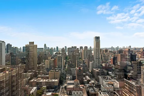 a view of a city with tall buildings