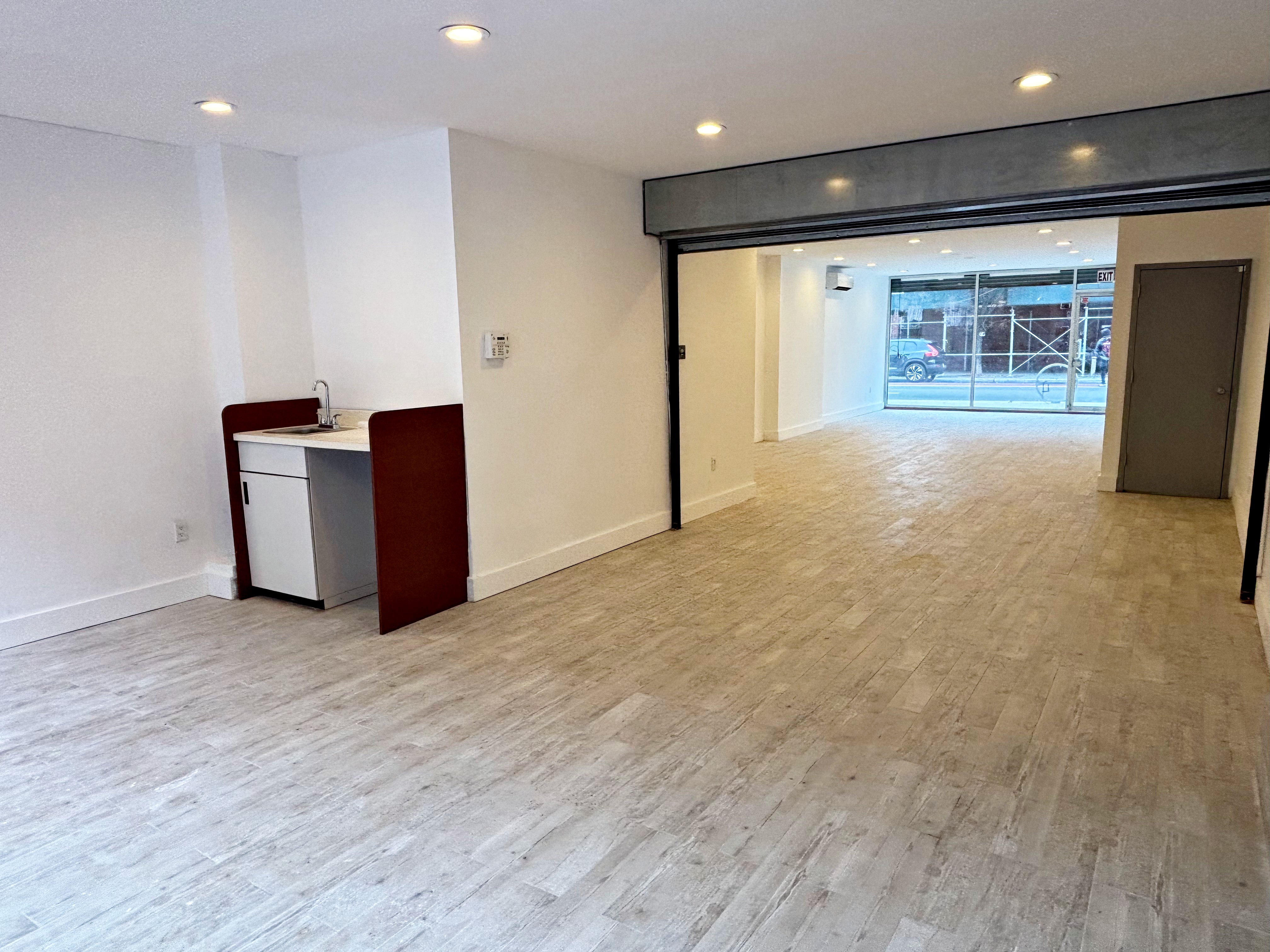 385 Nostrand Avenue, Unit Undisclosed Brooklyn, NY 11216 - Photo 7 of 27 a view of an empty room with wooden floor