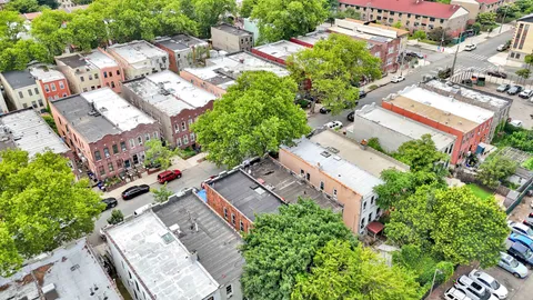 an aerial view of residential house with outdoor space