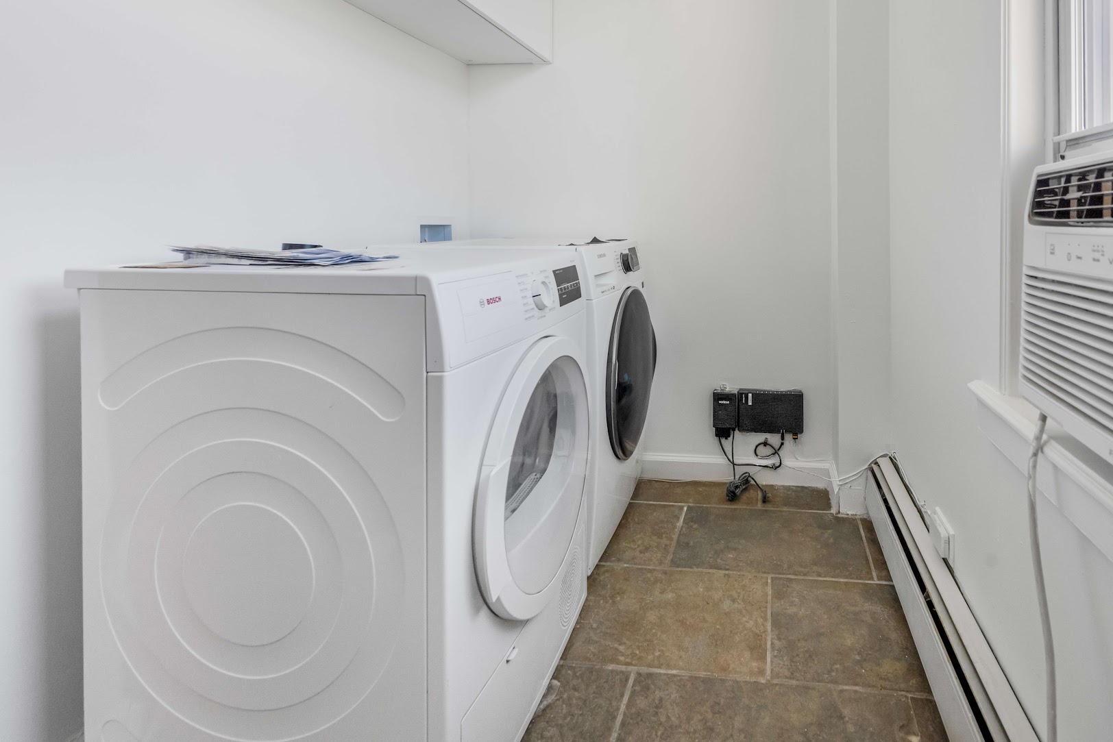 185 A Powers Street, Unit 3 Brooklyn, NY 11211 - Photo 9 of 12 a view of a storage & utility room with washer and dryer