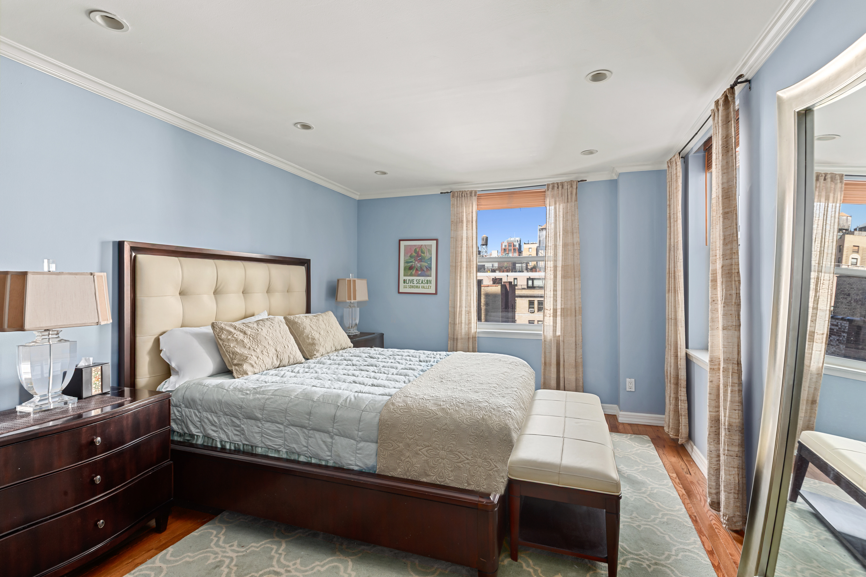 253 West 73rd Street, Unit 9G Manhattan, NY 10023 - Photo 4 of 9 a bedroom with a bed and a window
