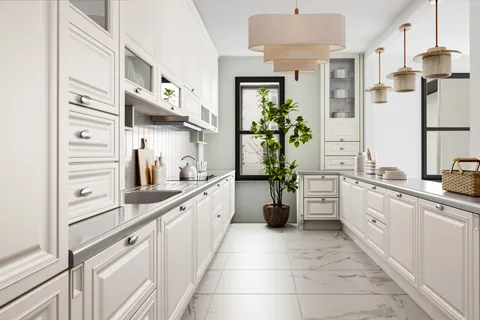 a large white kitchen with cabinets and a sink