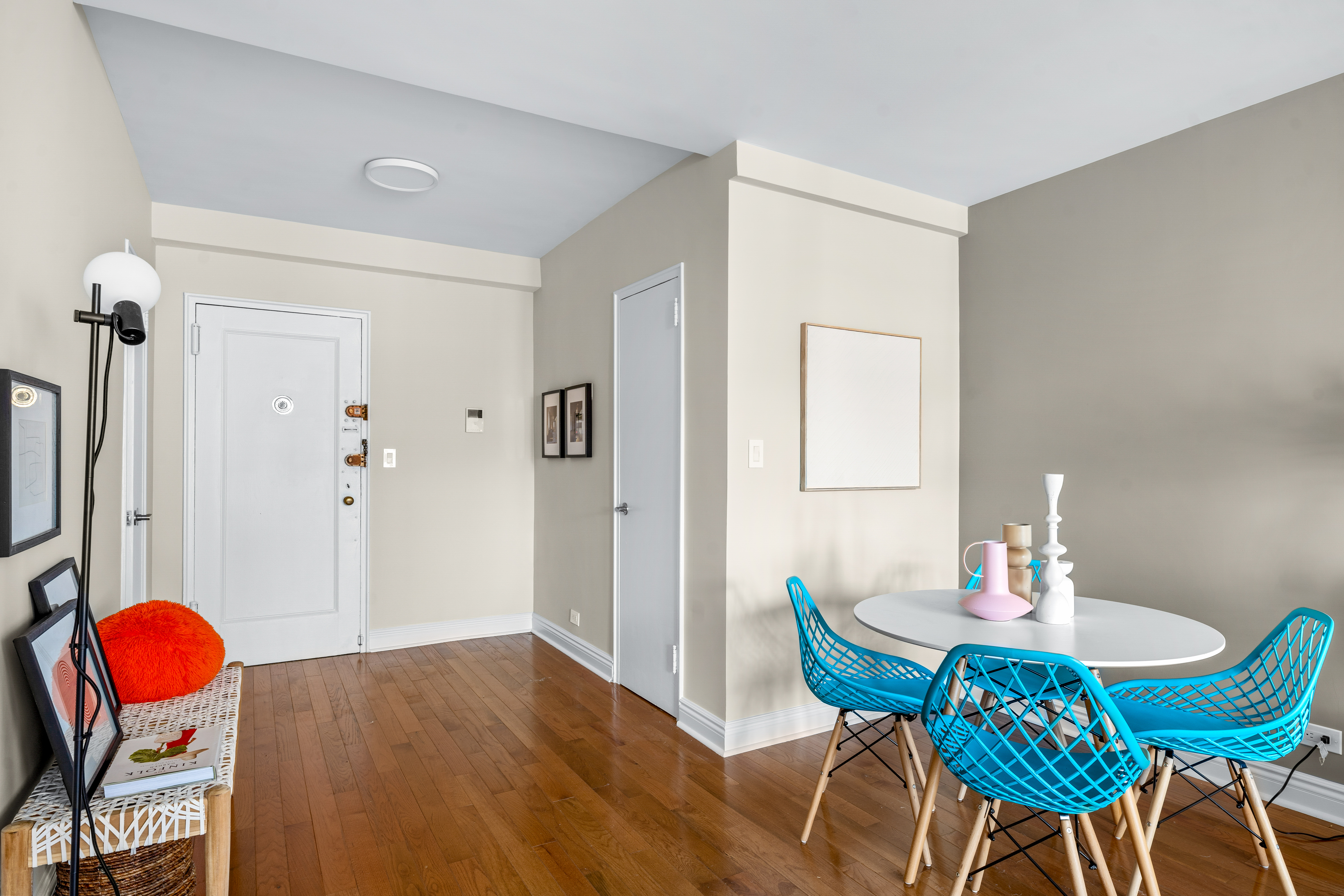 71-36 110th Street, Unit PH7E Queens, NY 11375 - Photo 5 of 16 a dining room with furniture and wooden floor
