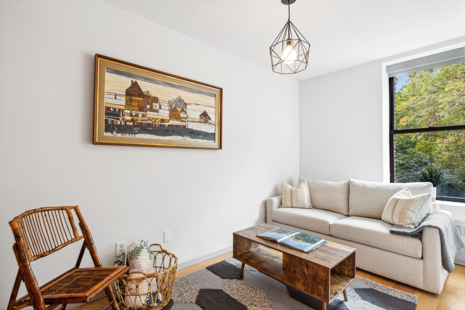 250 Manhattan Avenue, Unit 3A Manhattan, NY 10026 - Photo 6 of 15 a living room with furniture and a window