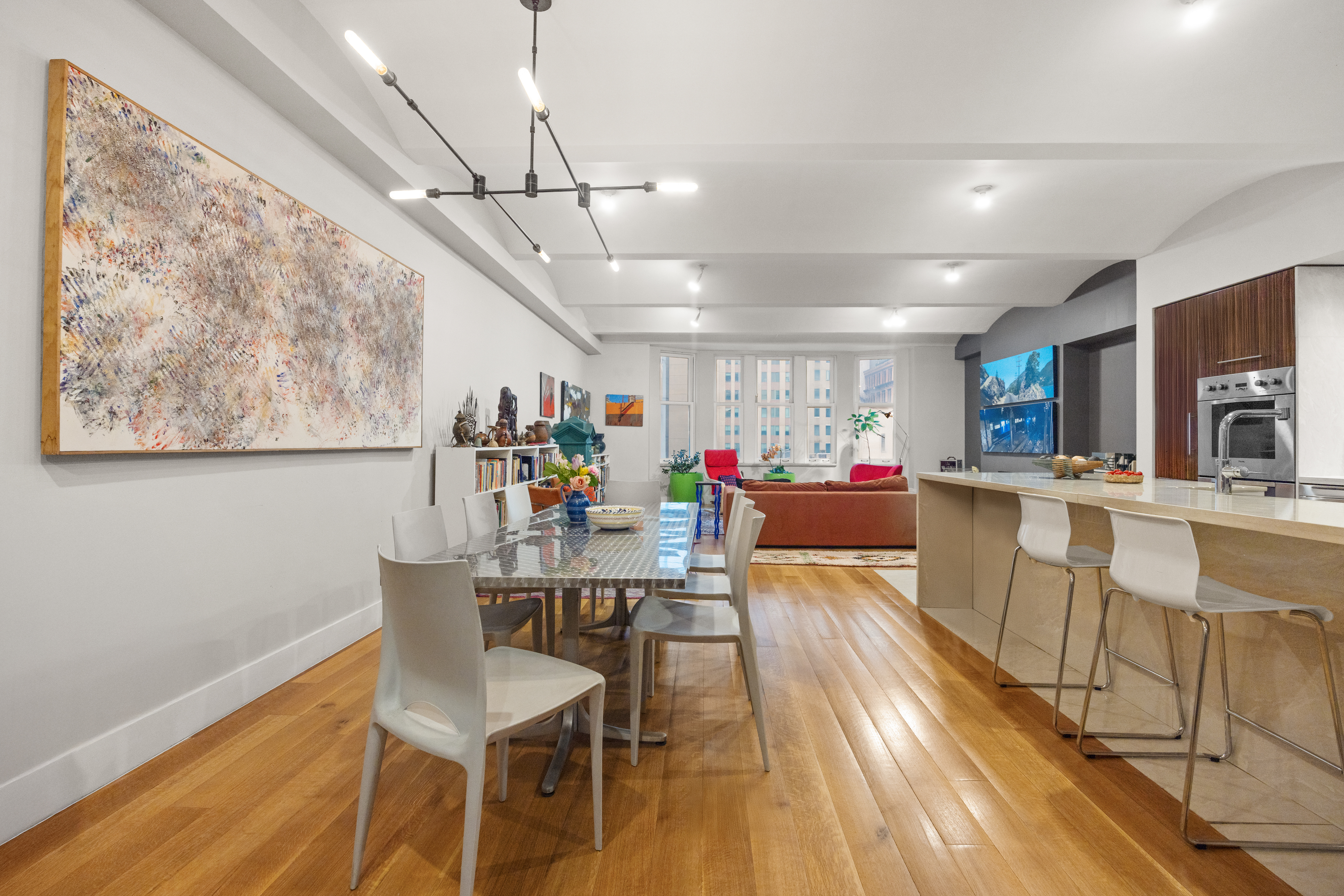 42 Ann Street, Unit 5 Manhattan, NY 10038 - Photo 6 of 16 a dining room with furniture and a wooden floor