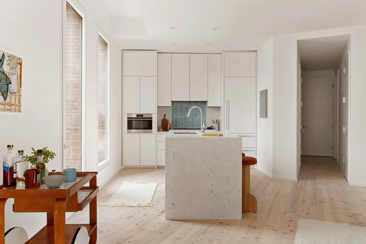 a workspace with furniture and window