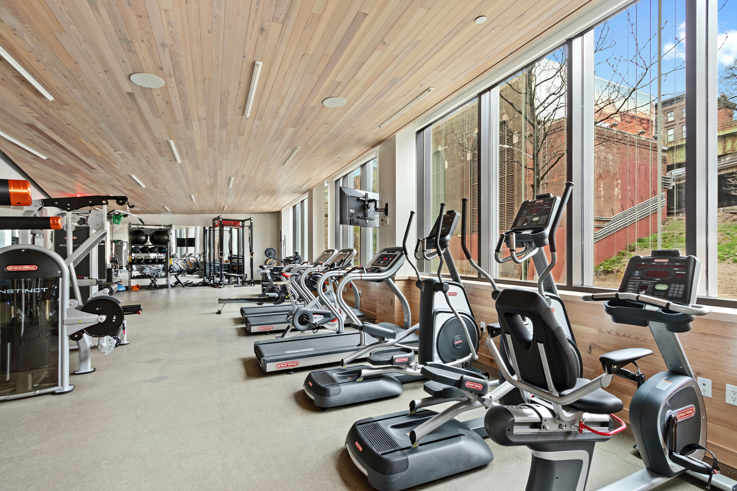 90 Furman Street, Unit N107 Brooklyn, NY 11201 - Photo 21 of 30 a view of a room with gym equipment