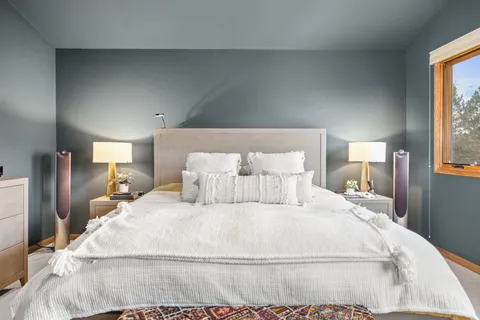 a large white bed in a white room